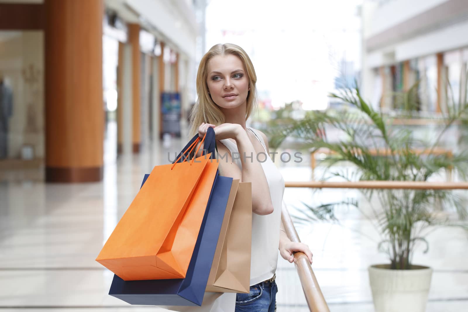 Shopping girl in mall by ALotOfPeople