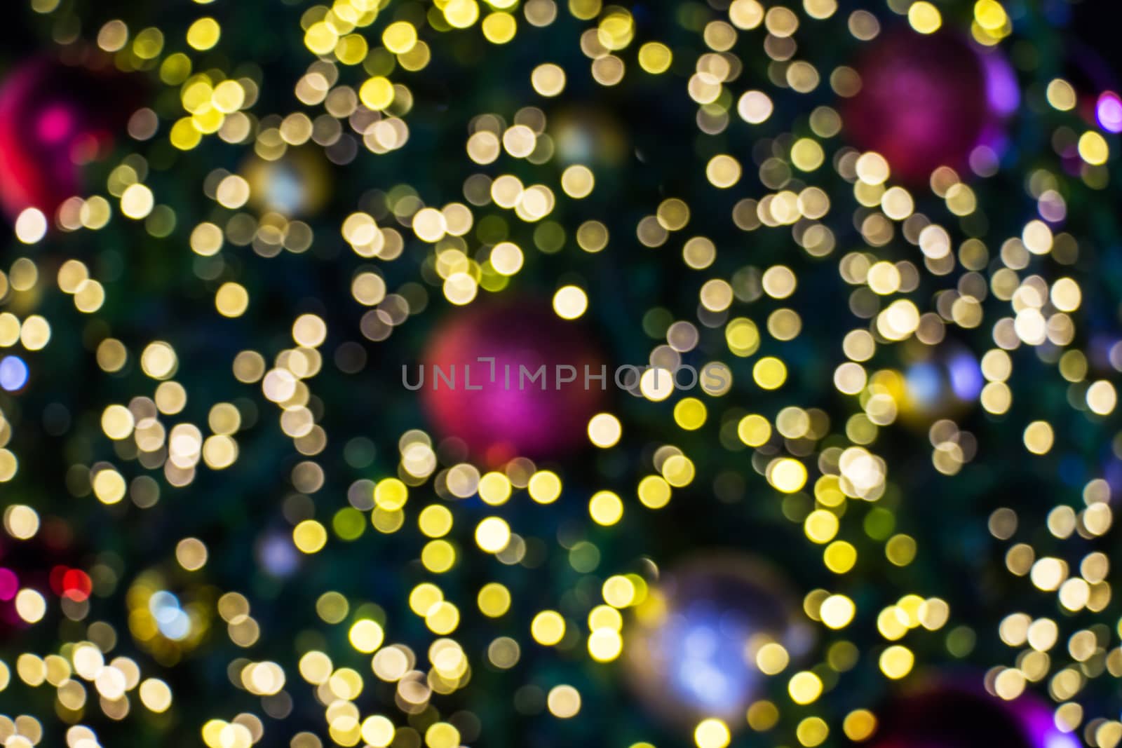 Blurred bokeh of Christmas light background. Close up decorations on Christmas celebration festival.