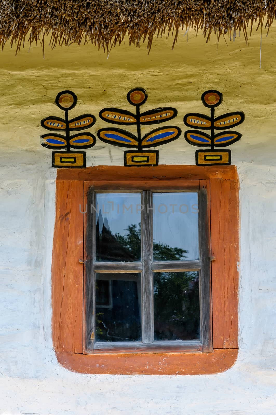 Detail of a window of a typical ukrainian antique house by MaxalTamor