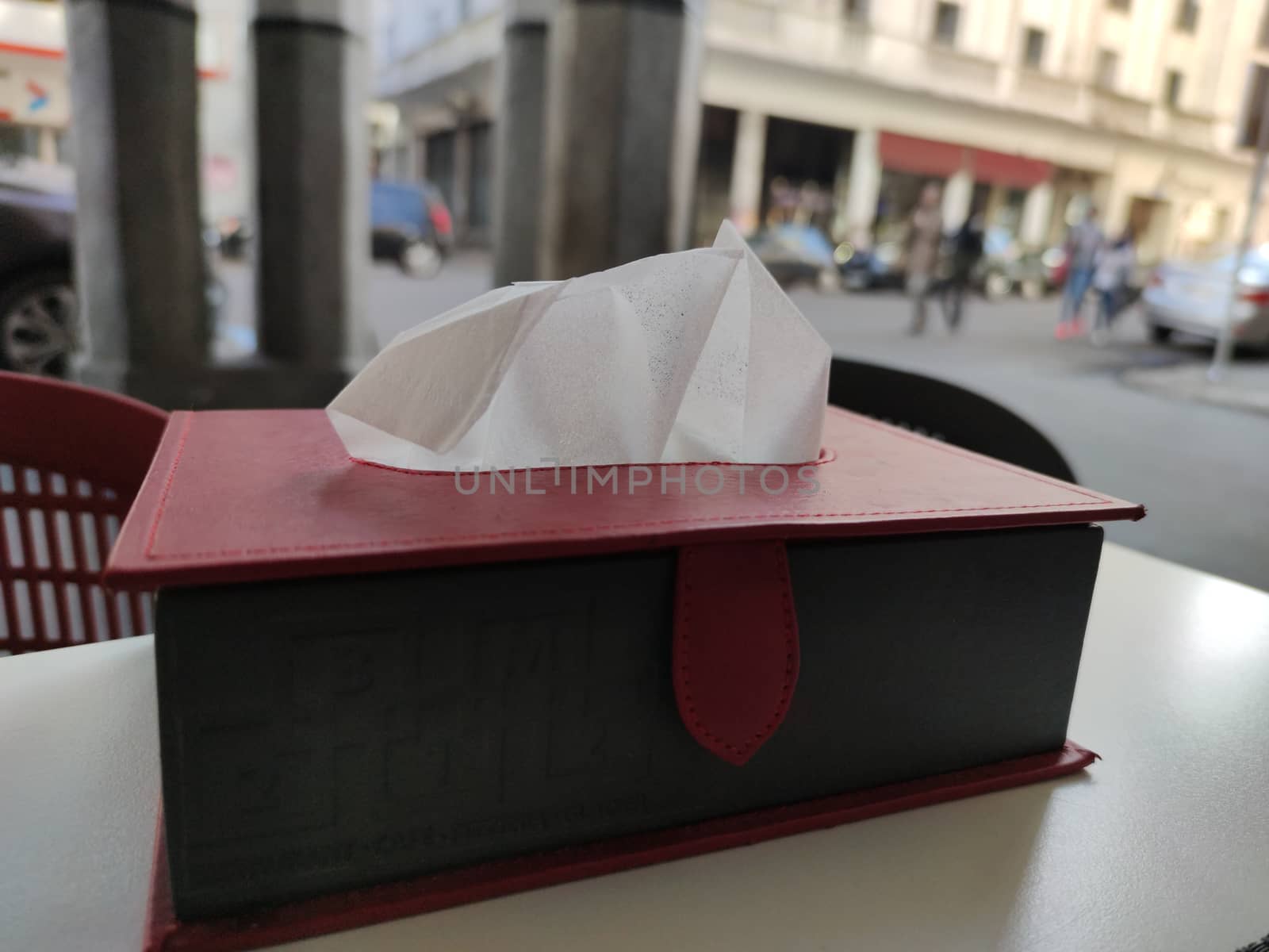 a box of napkin in a restaurant table