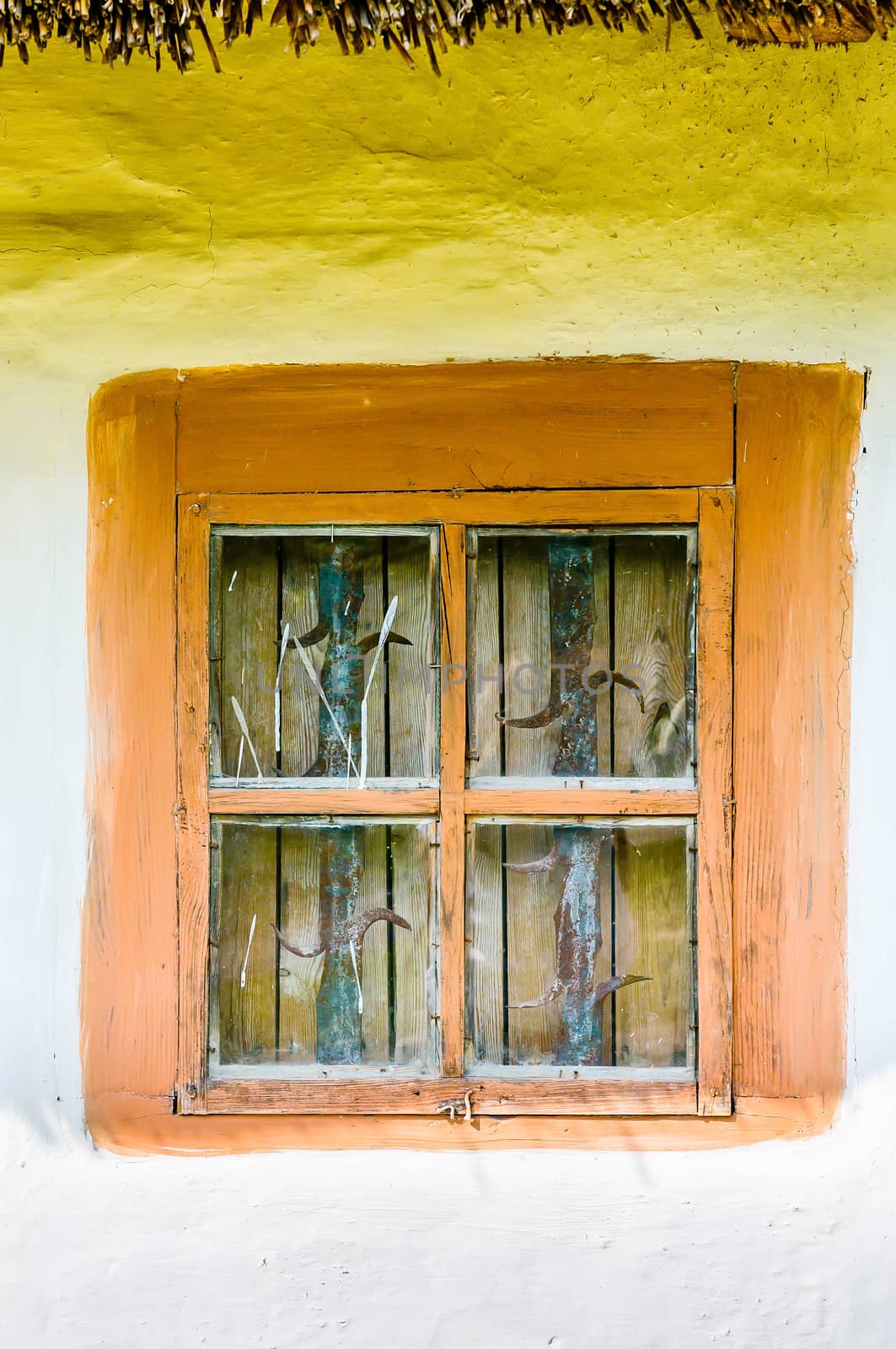 Detail of a window of a typical ukrainian antique house, in Pirogovo near Kiev