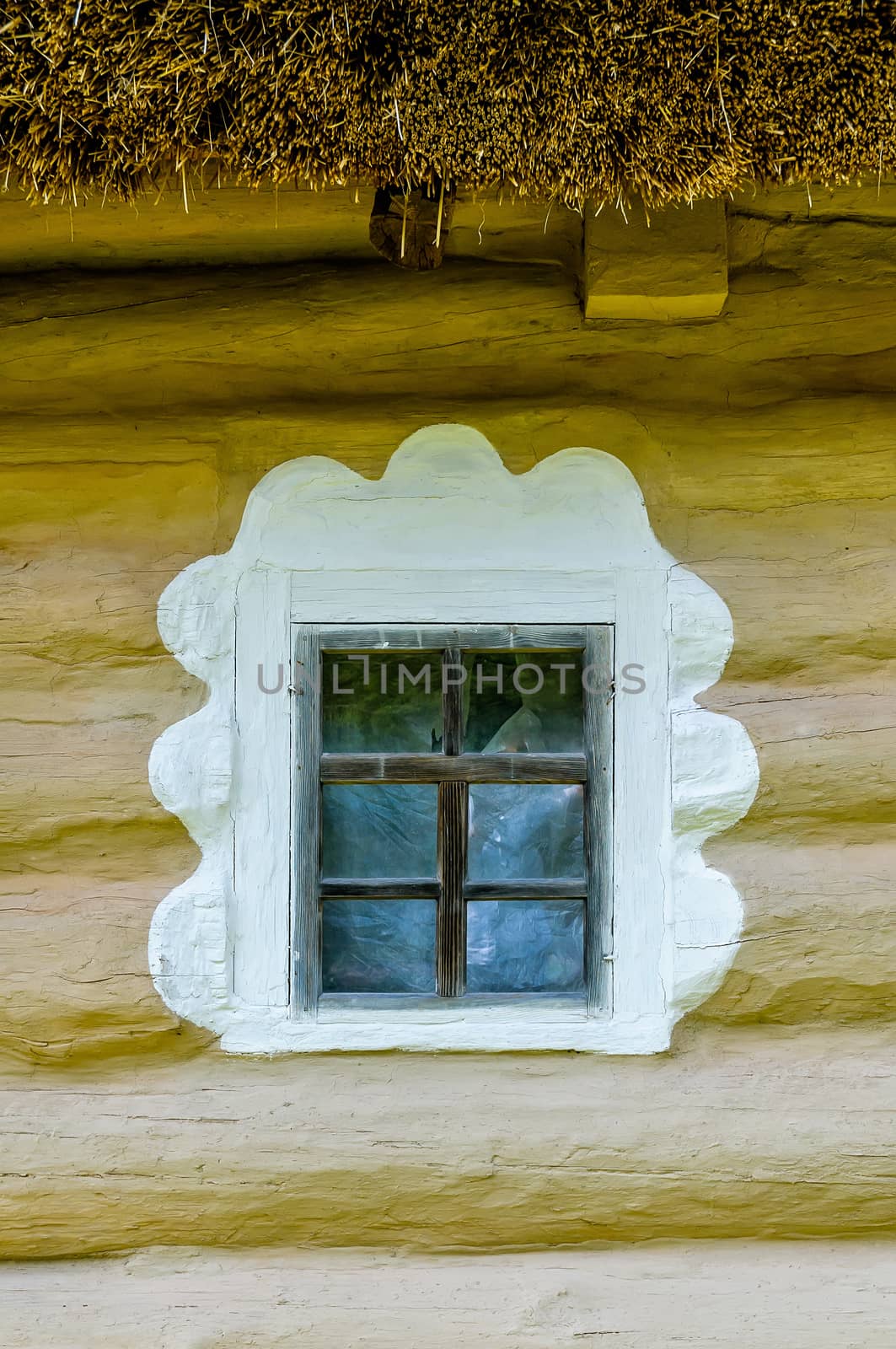 Detail of a window of a typical ukrainian antique house by MaxalTamor