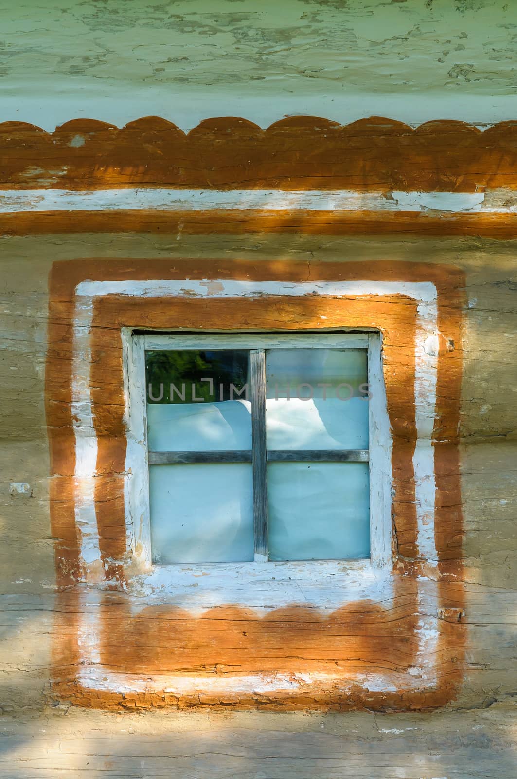 Detail of a window of a typical ukrainian antique house, in Pirogovo near Kiev