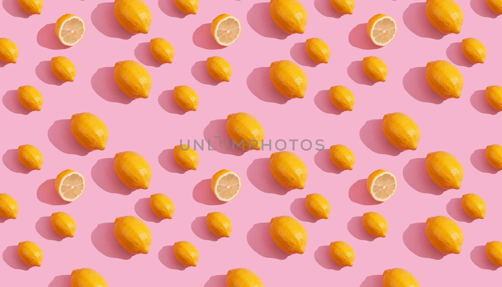 Trendy isometric Seamless continuous pattern of yellow lemons on pink background. Minimalist concept of fresh citrus fruit