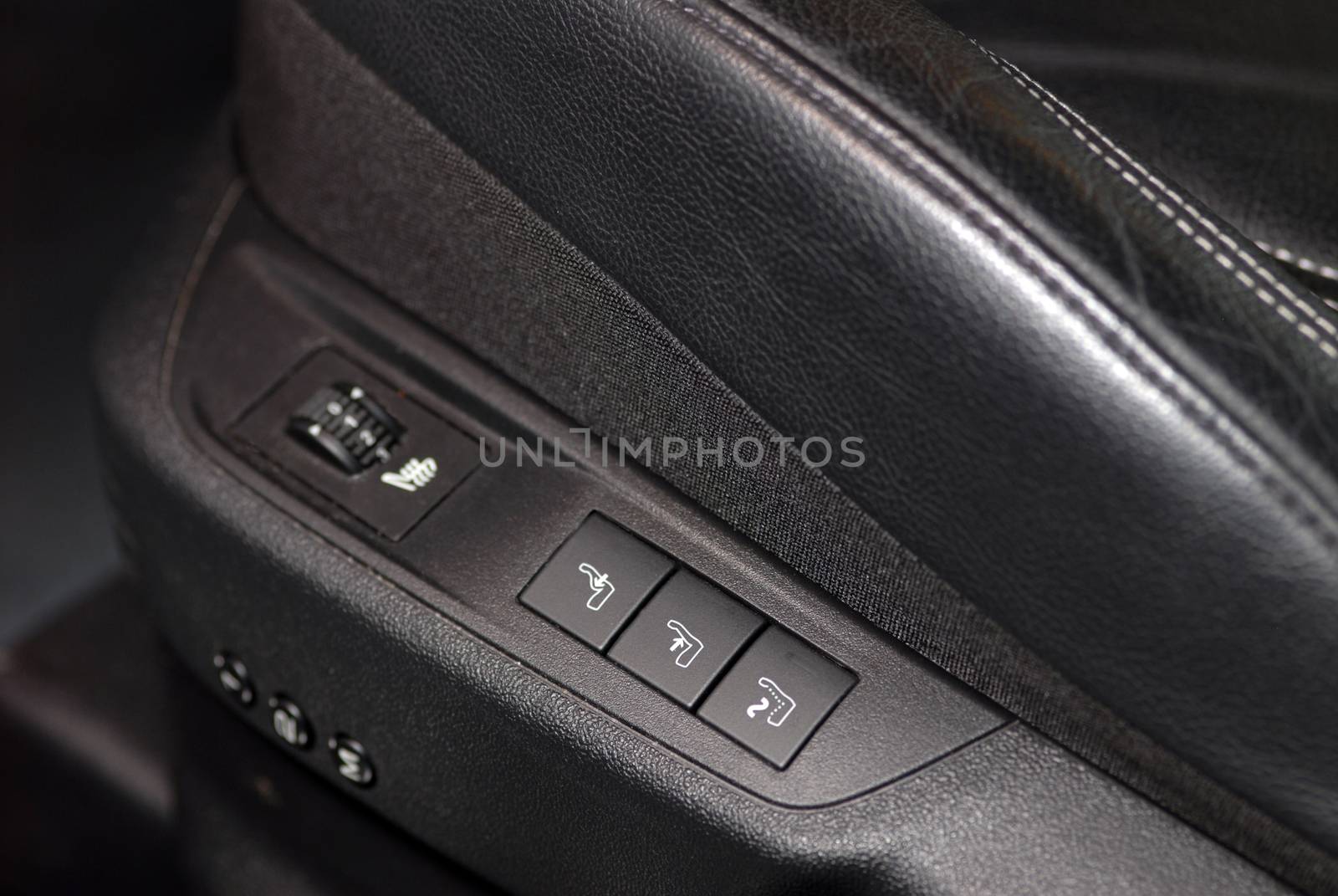 button to activate the massage in the front seats of passenger cars