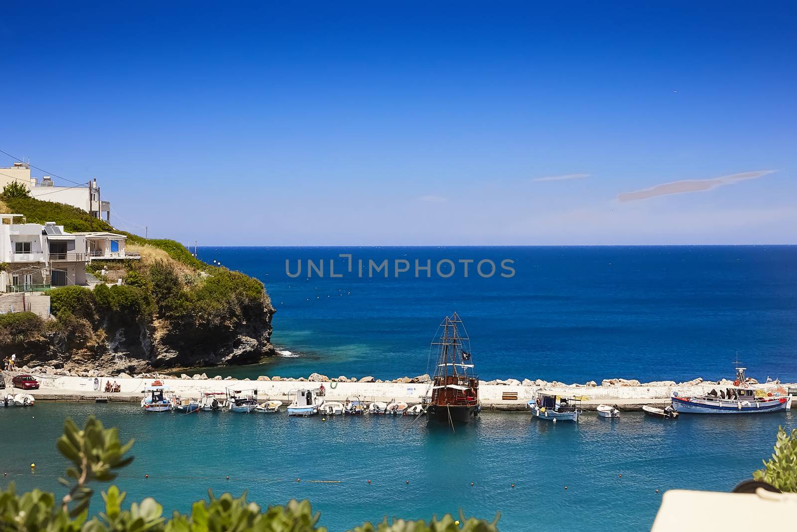 BALI, THE CRETE ISLAND, GREECE - JUNE 5, 2019: The beautiful seaview to the harbour of Bali. by helga_preiman