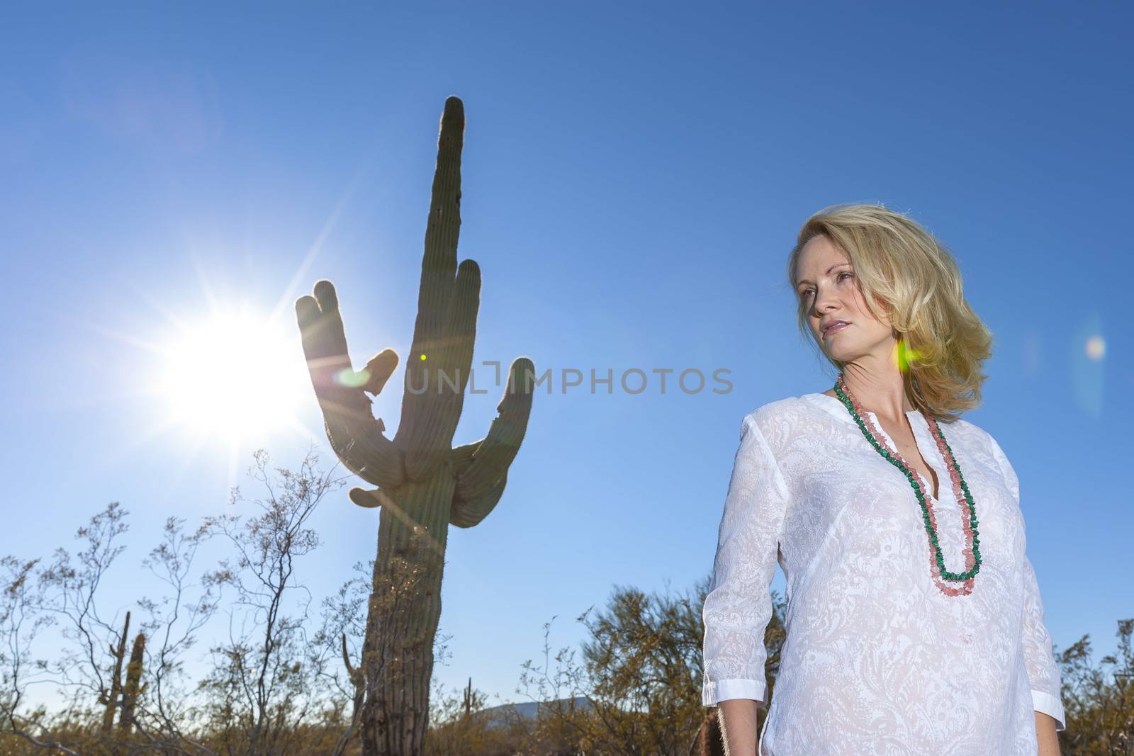 A gorgeous blonde model enjoys a spring day outdoors in the American Southwest
