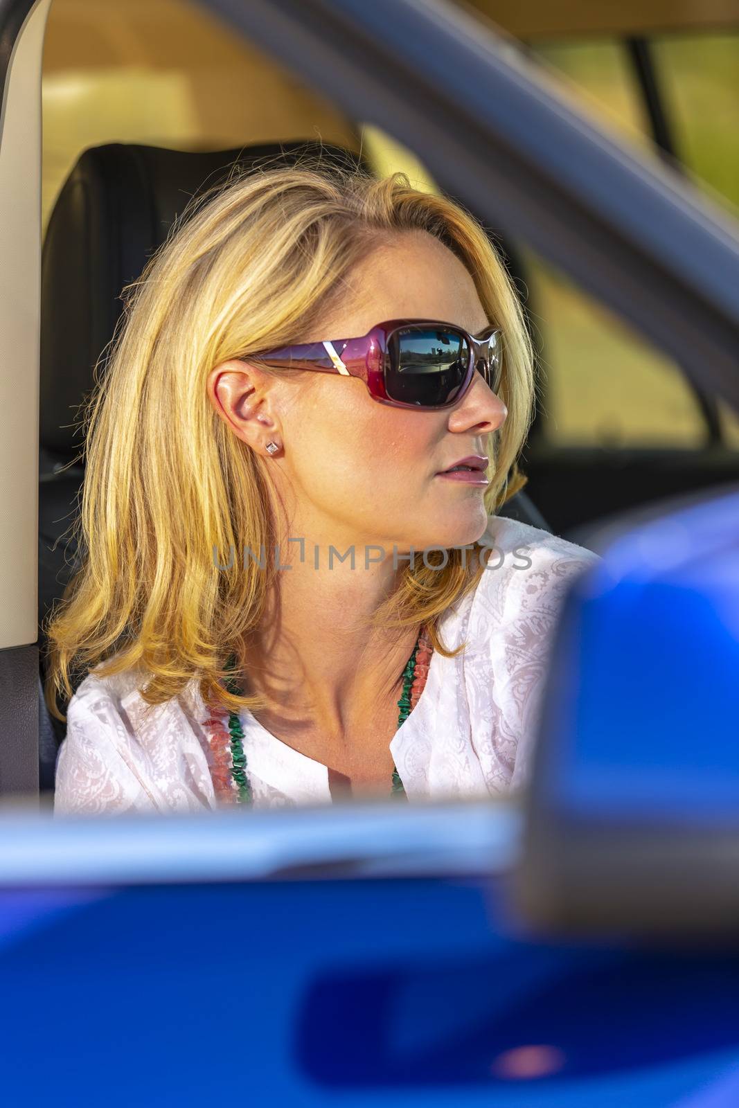 A gorgeous blonde model enjoys a spring day outdoors in the American Southwest