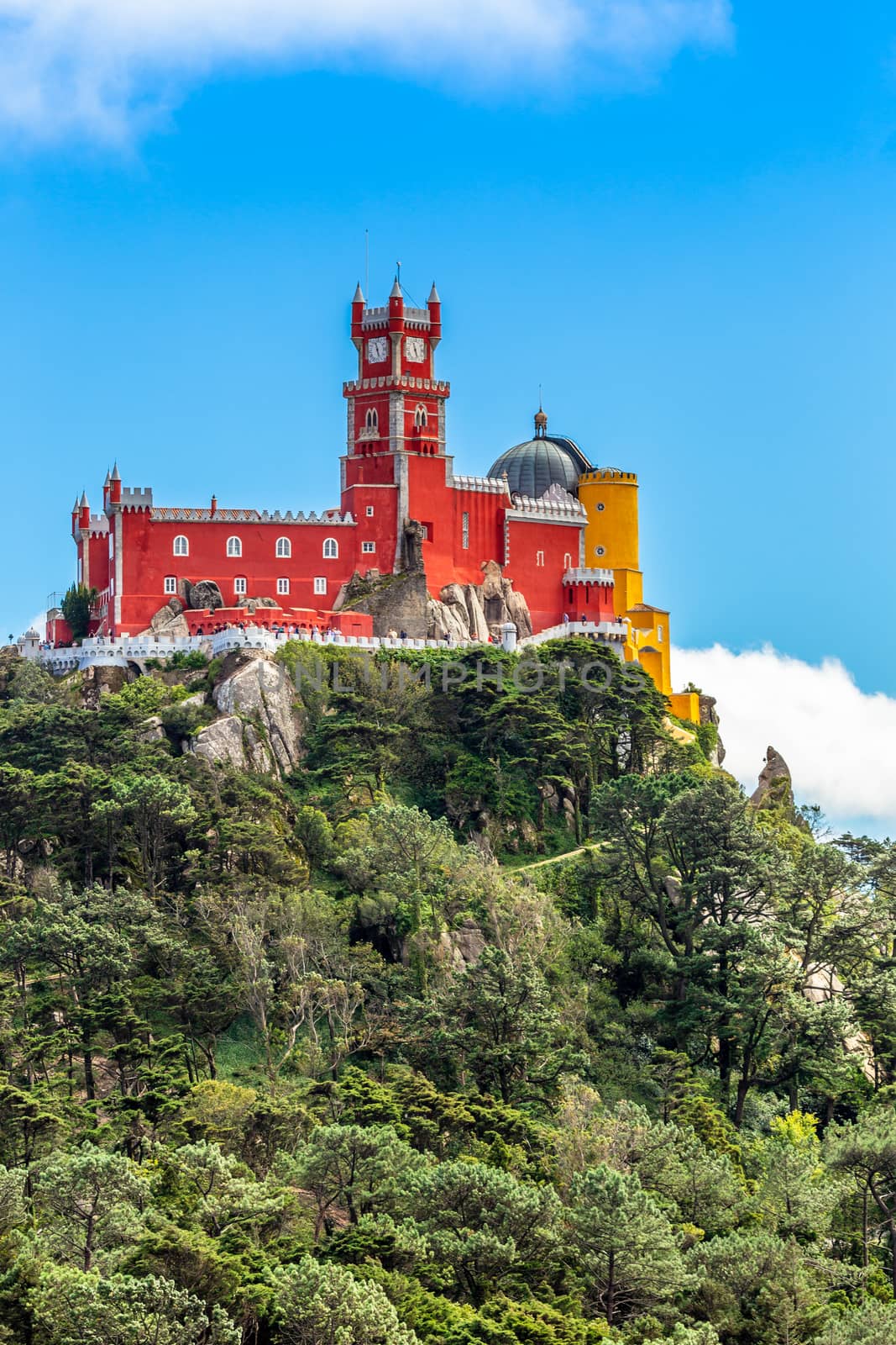 The red and yellow walls and towers of Pena Palace, Sao Pedro de Penaferrim, Sintra, Portugal