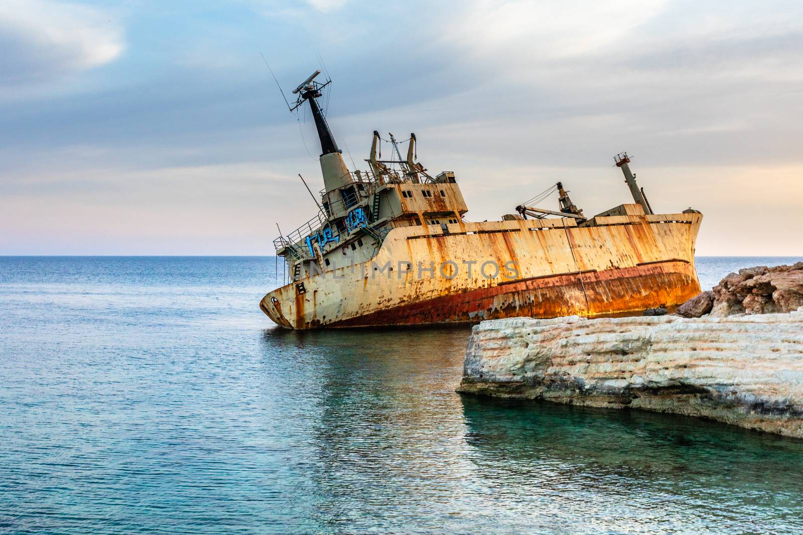 Abandoned rusty ship stranded ashore nearby Peyia village, Papho by ambeon