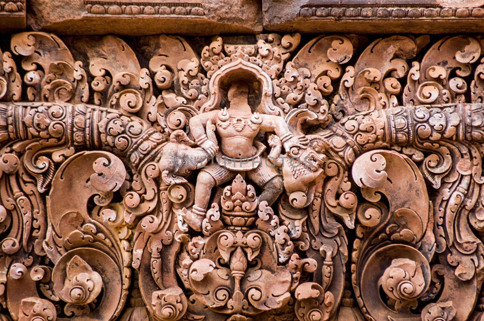 God and Monsters carving, Banteay Srei Temple by BasPhoto