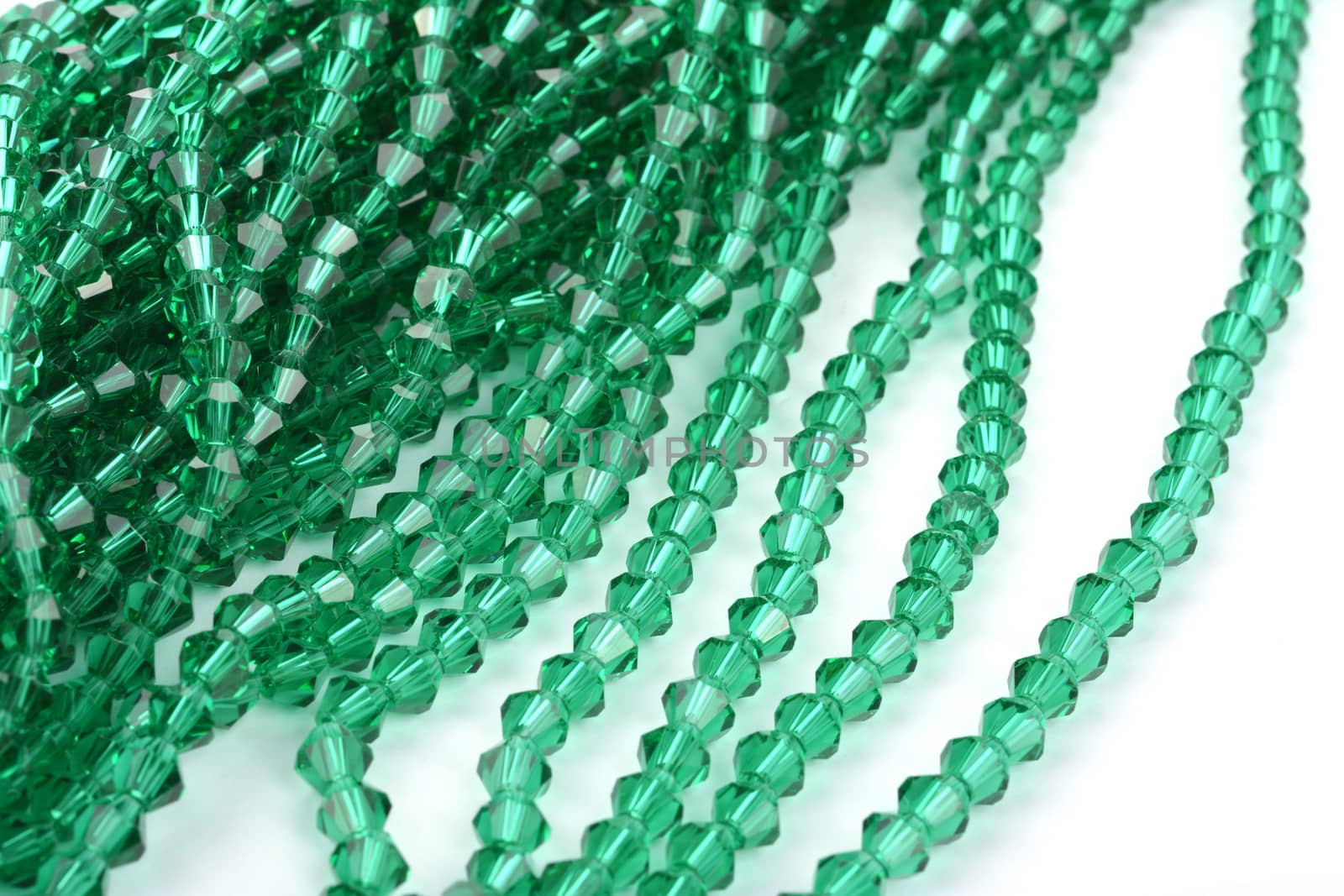 Beautiful Light green Glass Sparkle Crystal Isoalted Beads on white background. Use for diy beaded jewelry