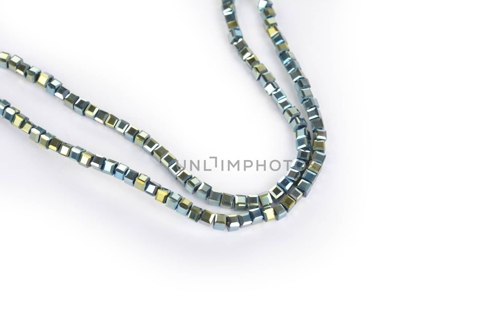 Beautiful Light green Glass Sparkle Crystal Isoalted Beads on white background. Use for diy beaded jewelry