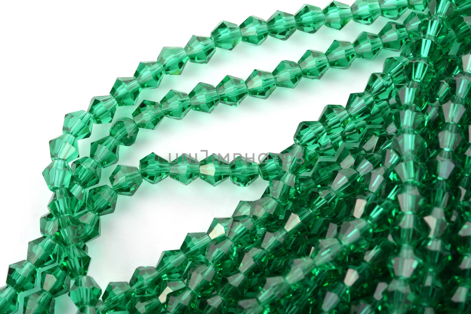 Beautiful Light green Glass Sparkle Crystal Isoalted Beads on white background. Use for diy beaded jewelry