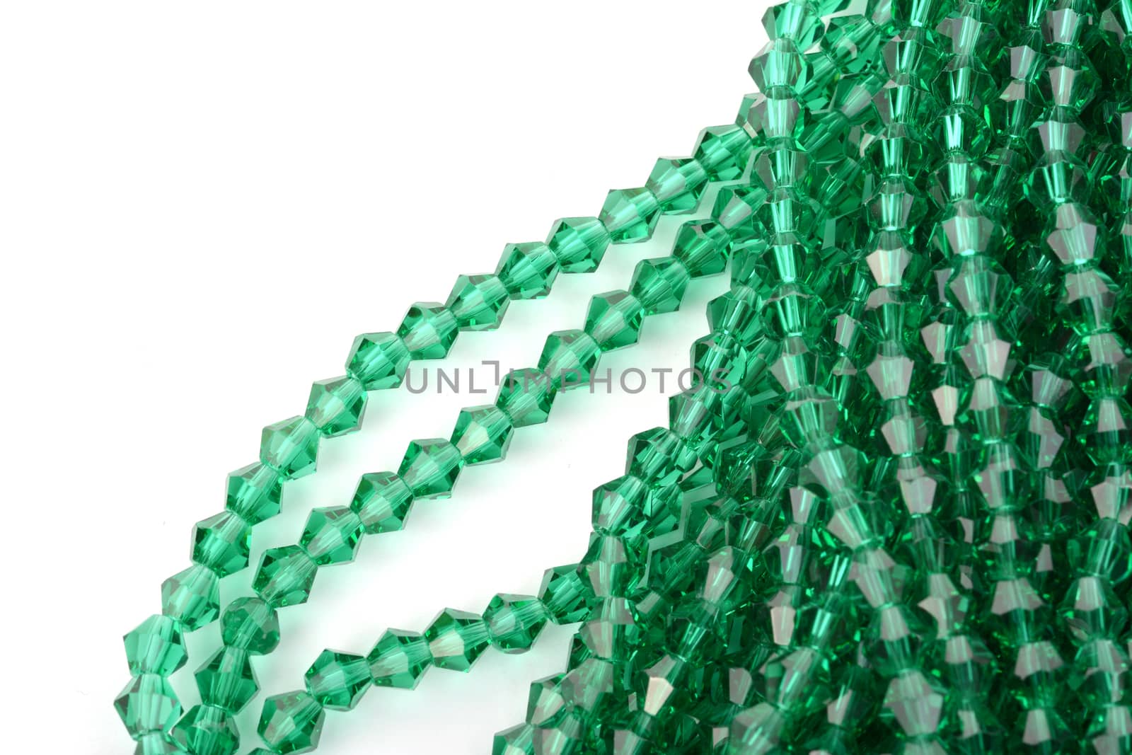 Beautiful Light green Glass Sparkle Crystal Isoalted Beads on white background. Use for diy beaded jewelry