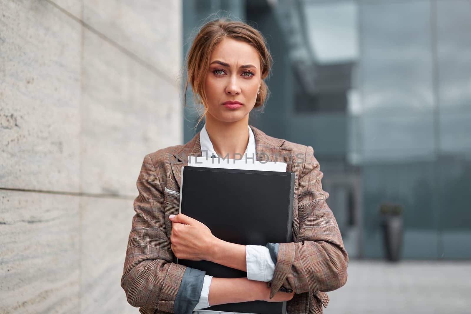 Businesswoman successful woman business person standing outdoor corporate building exterior Pensive elegance cute caucasian confidence professional business woman holding folder documents Bank worker