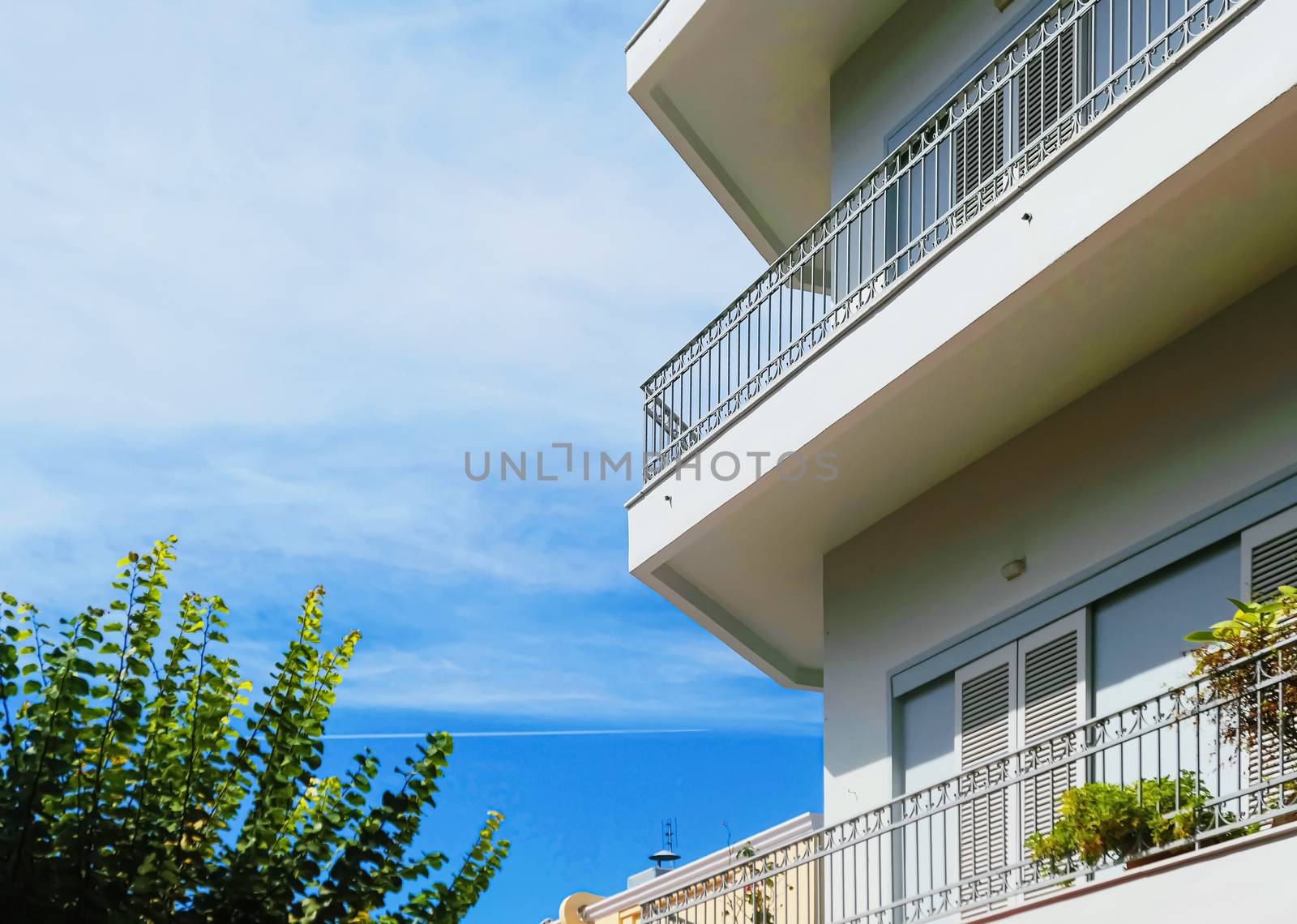 Architectural detail of a luxury classic villa on the Mediterranean coast, summer holiday and real estate by Anneleven