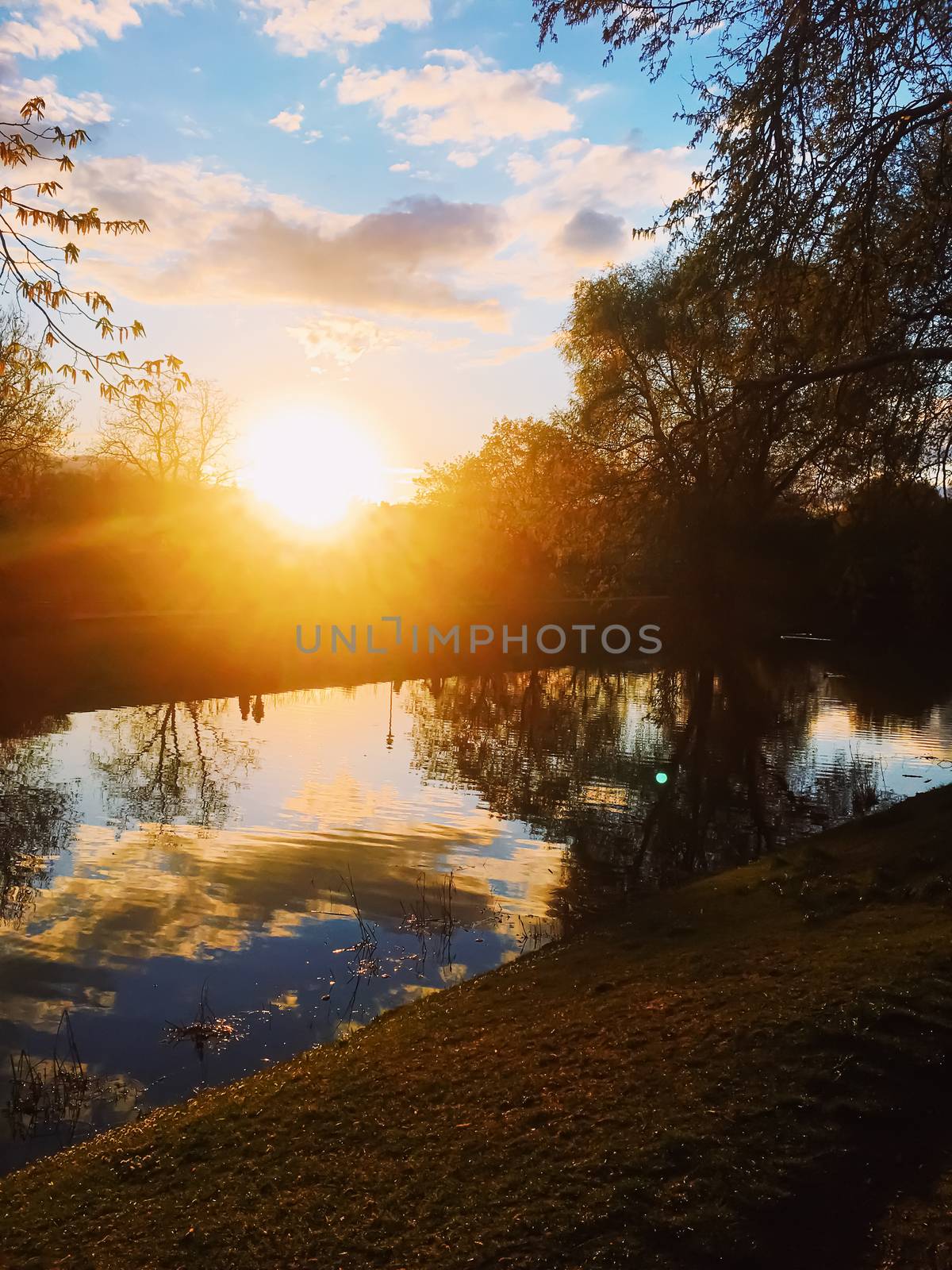 Sunset over the river in spring, nature and environment