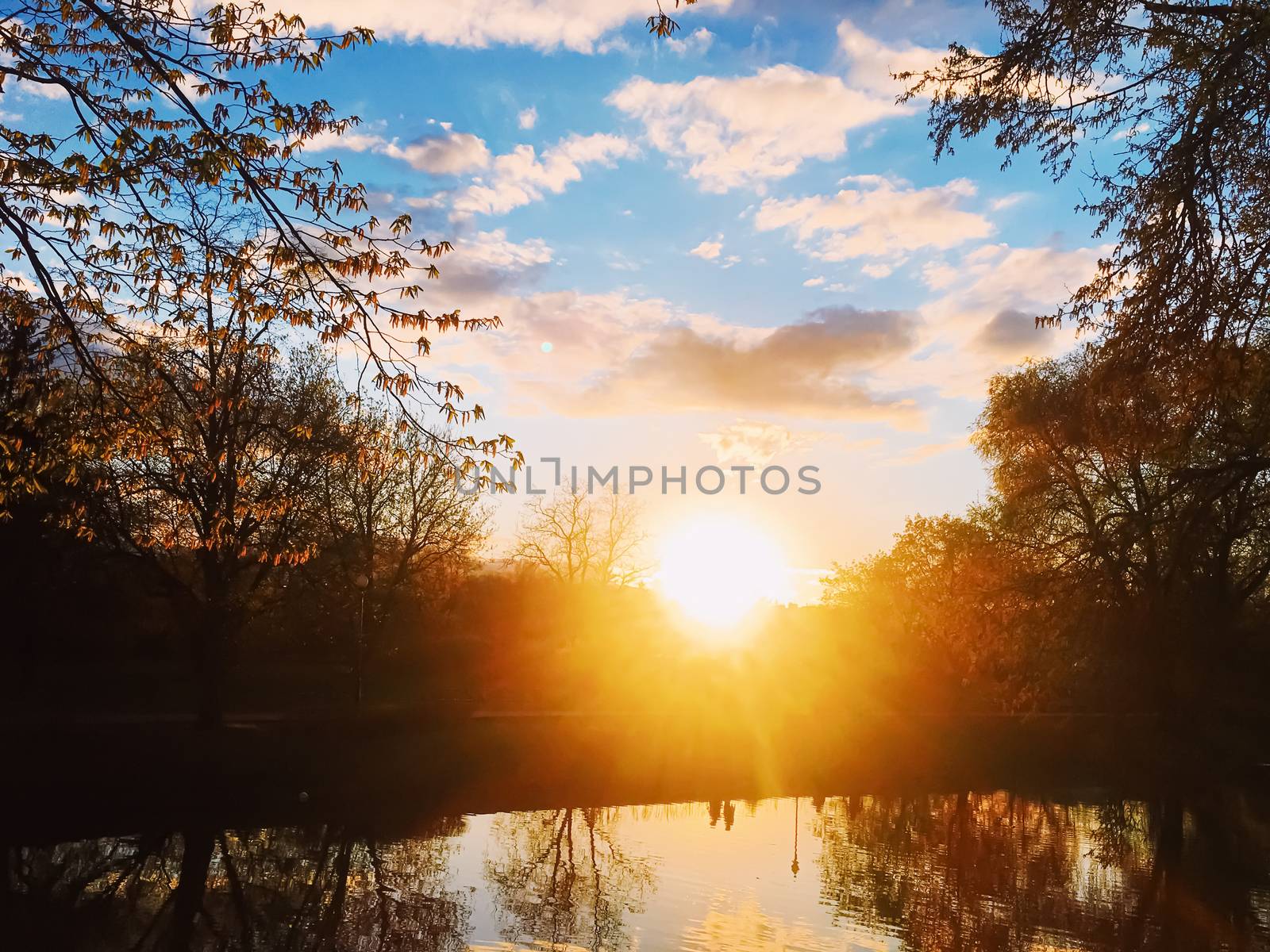 Sunset over the river in spring by Anneleven