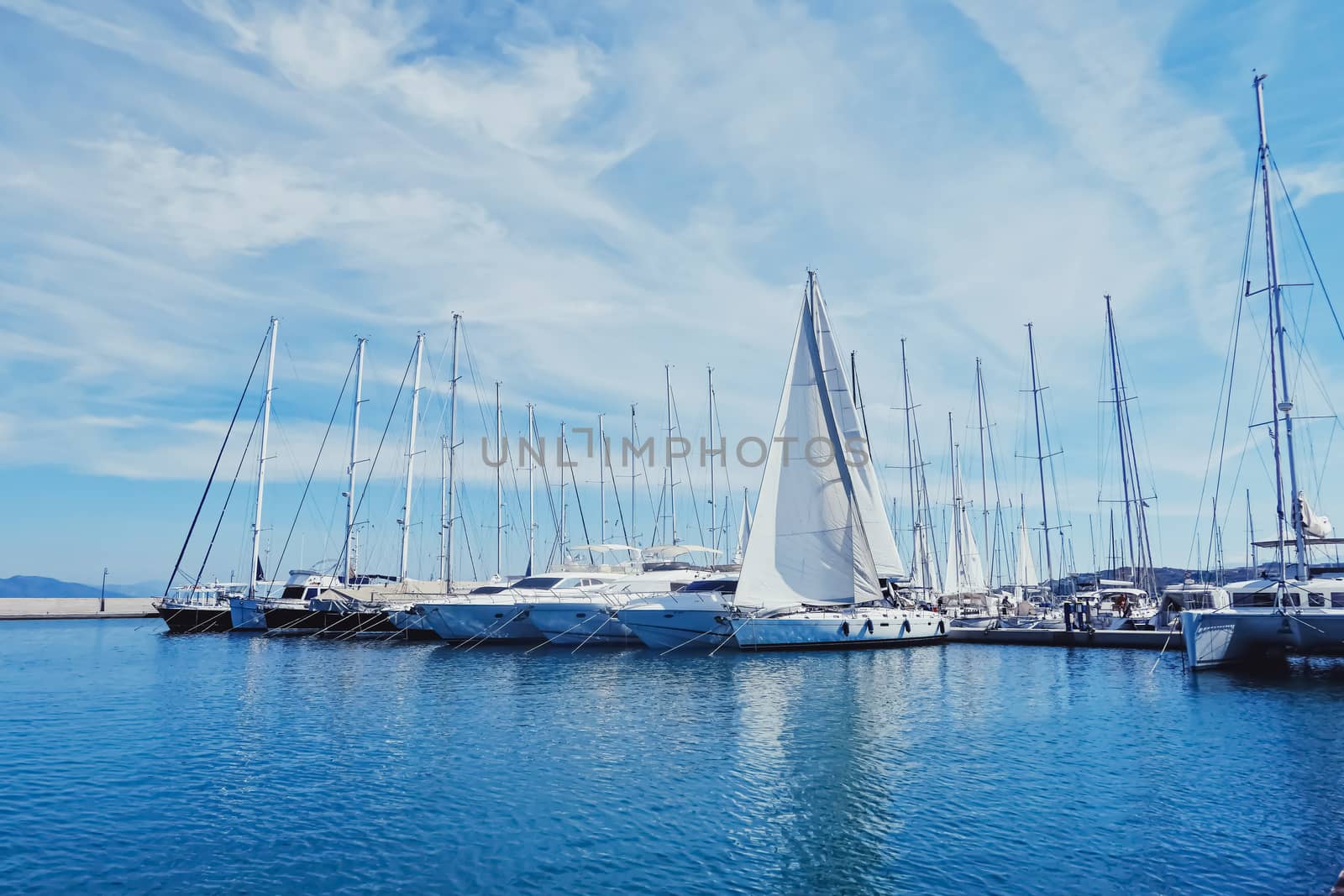 Yachts and boats in the harbor on Mediterranean sea coast, travel and leisure by Anneleven