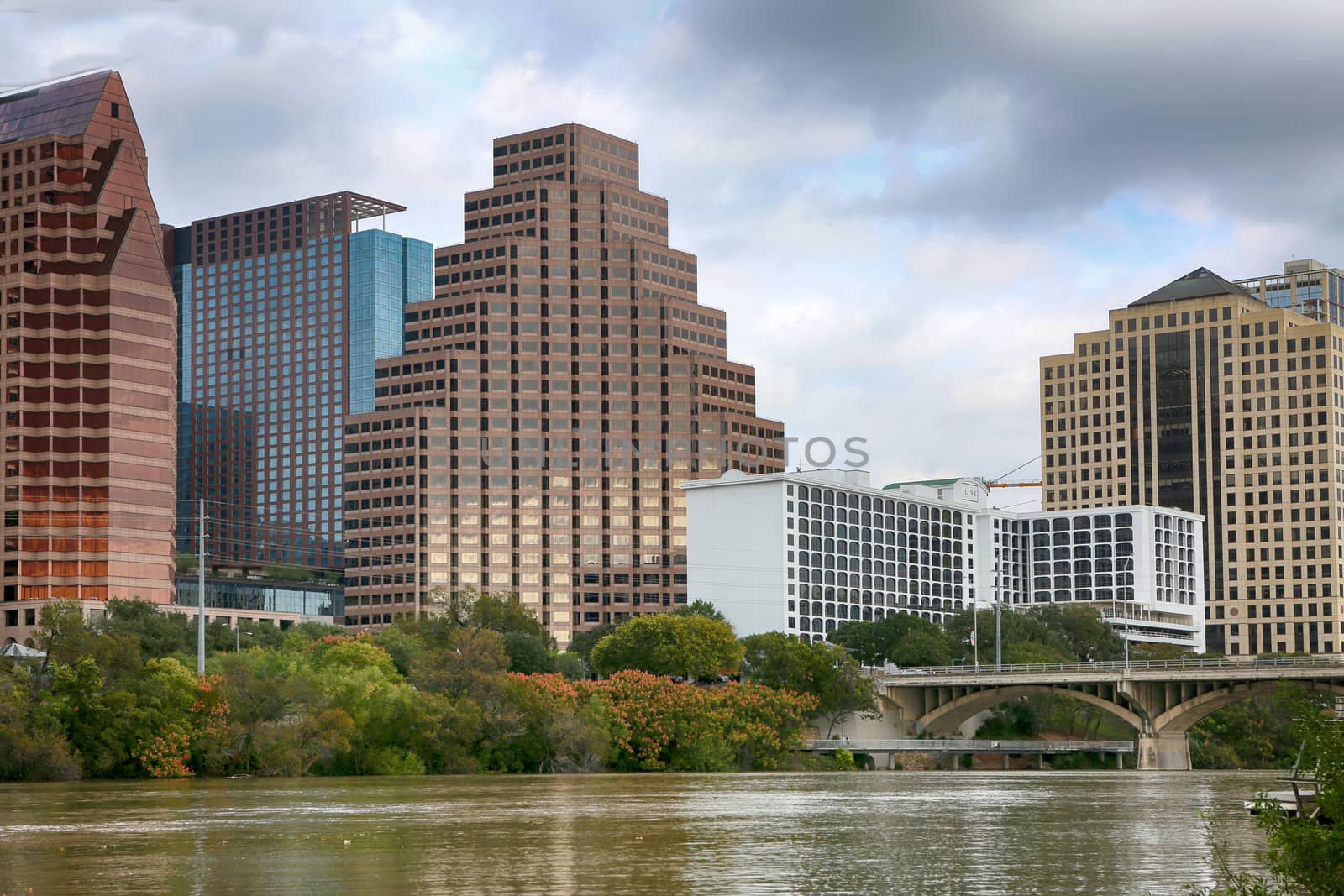 Austin, Texas: A downtown skyline on the Colorado River. Austin is the capital of the U.S. state of Texas and "world capital of life music".
