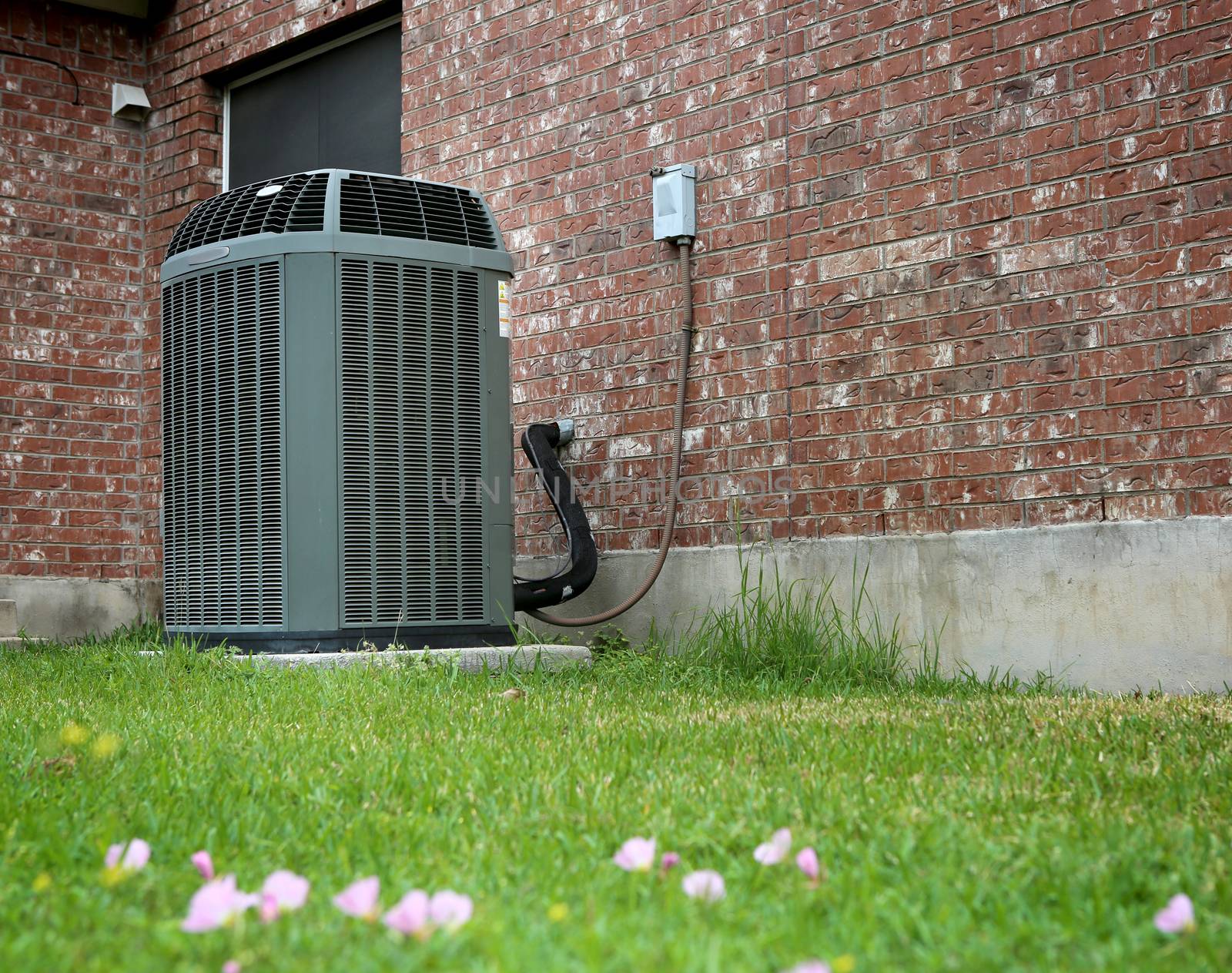 High efficiency modern AC-heater, modern air conditioner on backyard