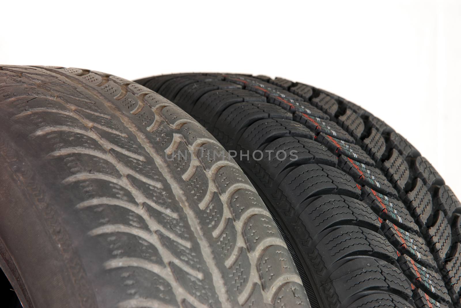 Fragment a old and new modern winter car tires