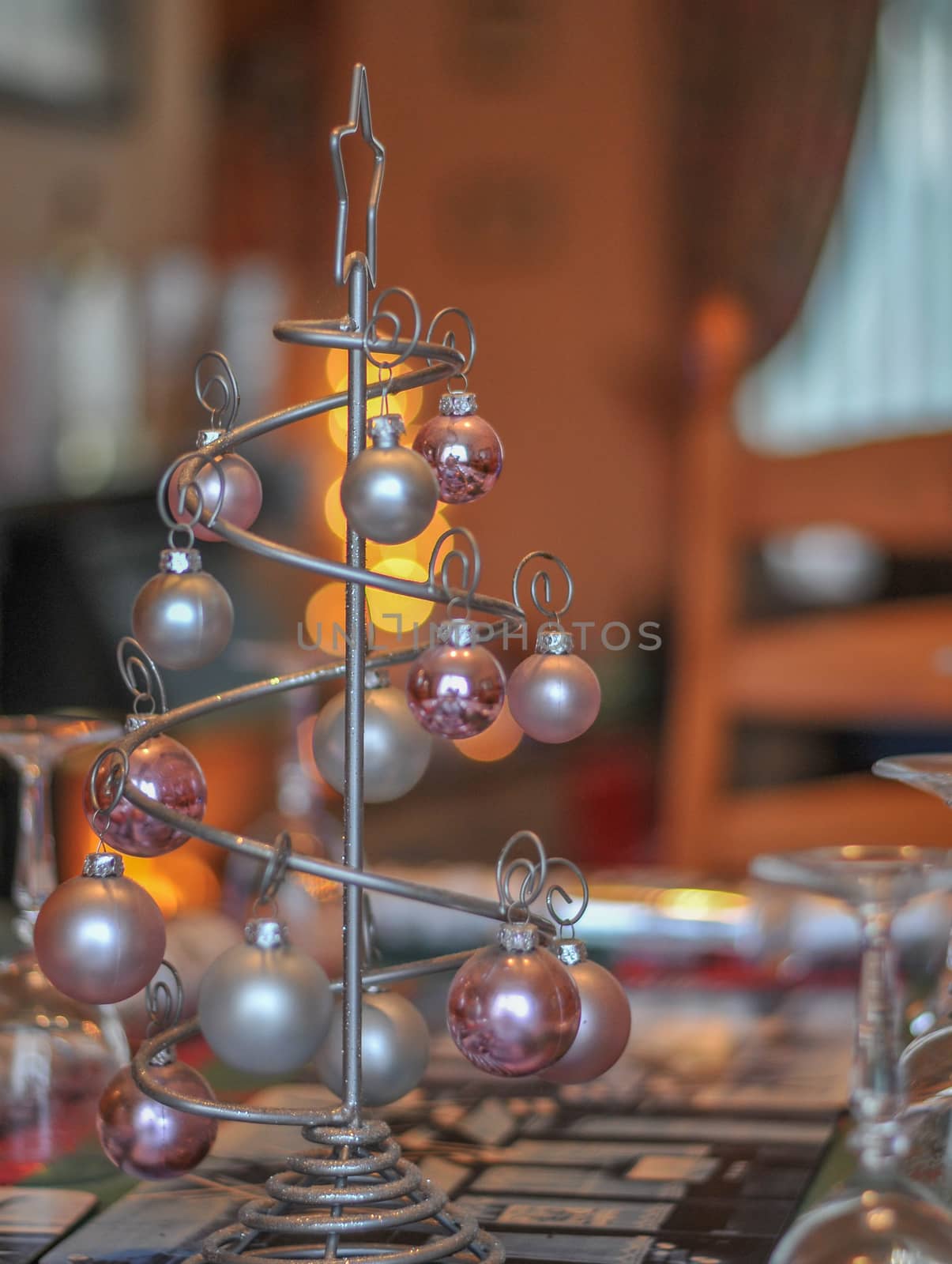 baubals on a table with bokeh by sirspread
