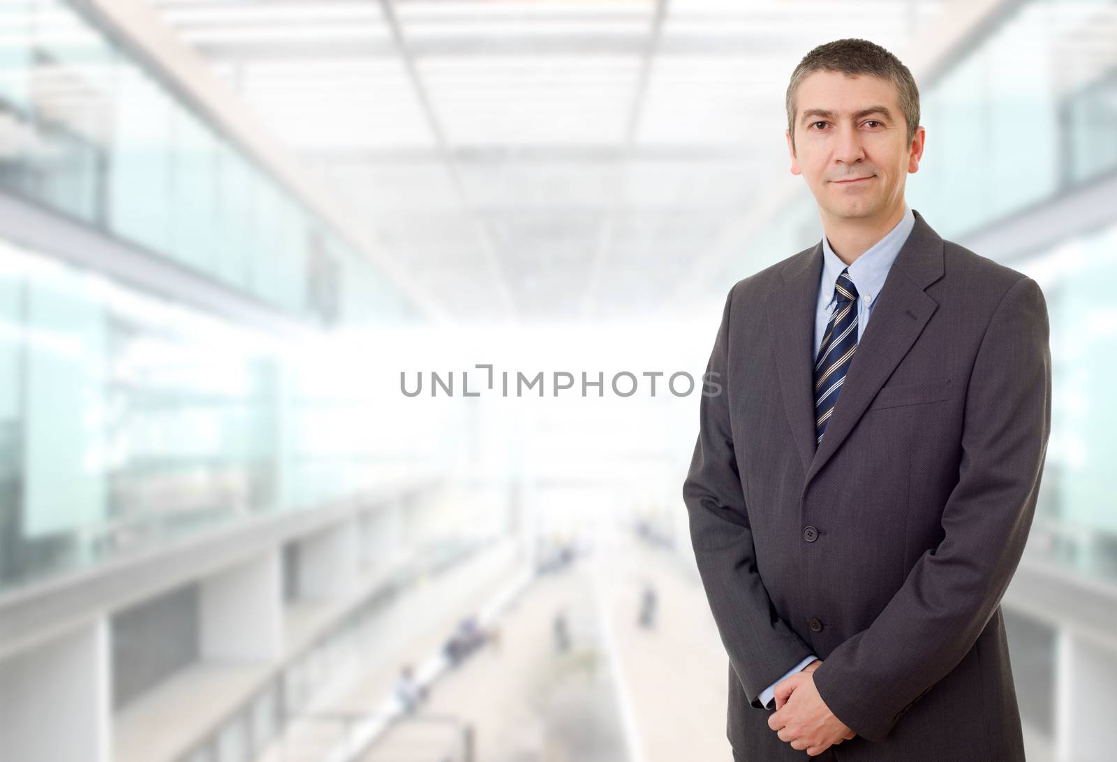 happy business man portrait at the office