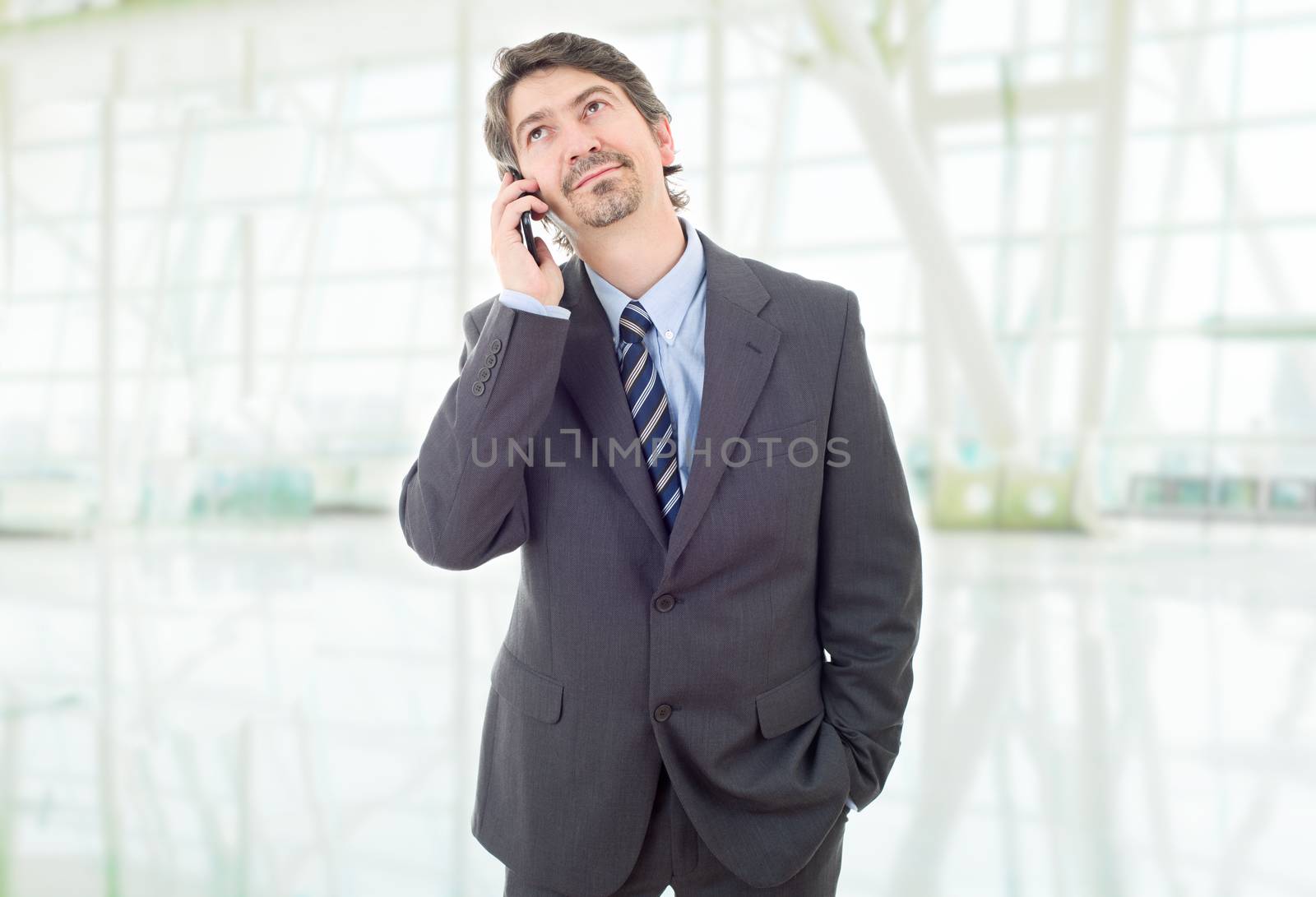 young business man on the phone, at the office