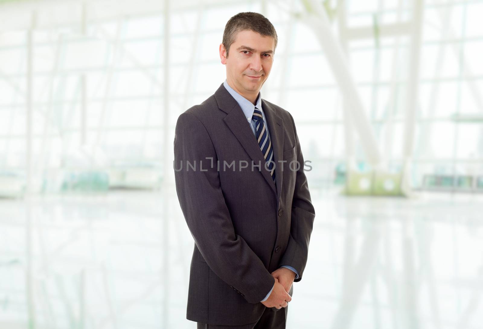 happy business man portrait at the office