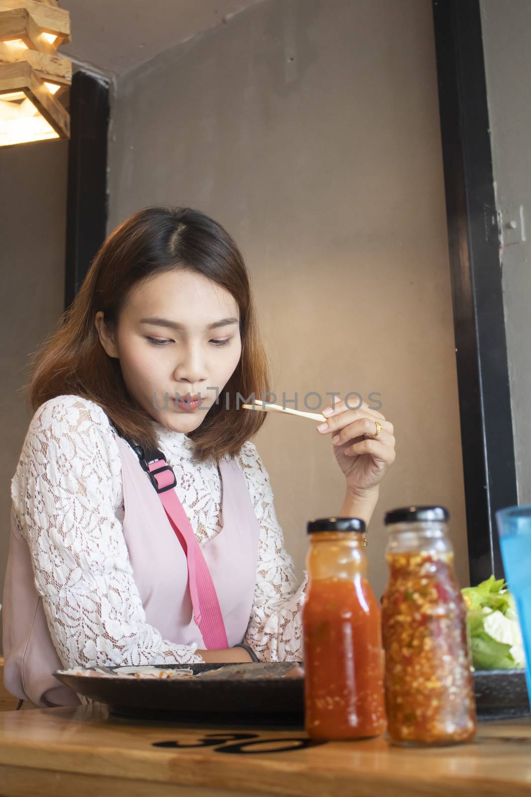 young asian woman enjoy eating Shabu-Shabu japanese hot pot by Gobba17