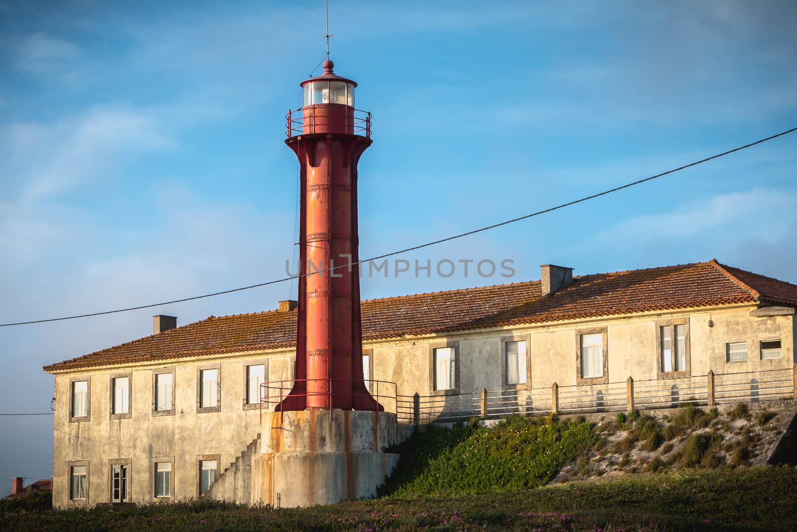 Esposende, Portugal - May 8, 2018: Architectural detail of the Esposende lighthouse near Sao Joao Baptista Fort by the sea on a spring day