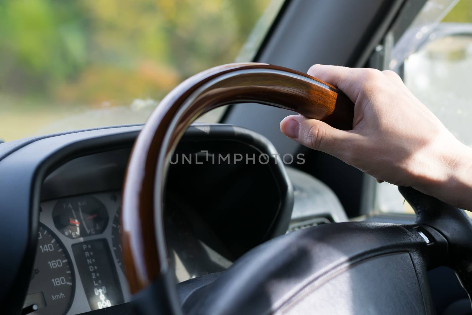 view of the hand of the people, the driver, holding the wheel of the car by jk3030