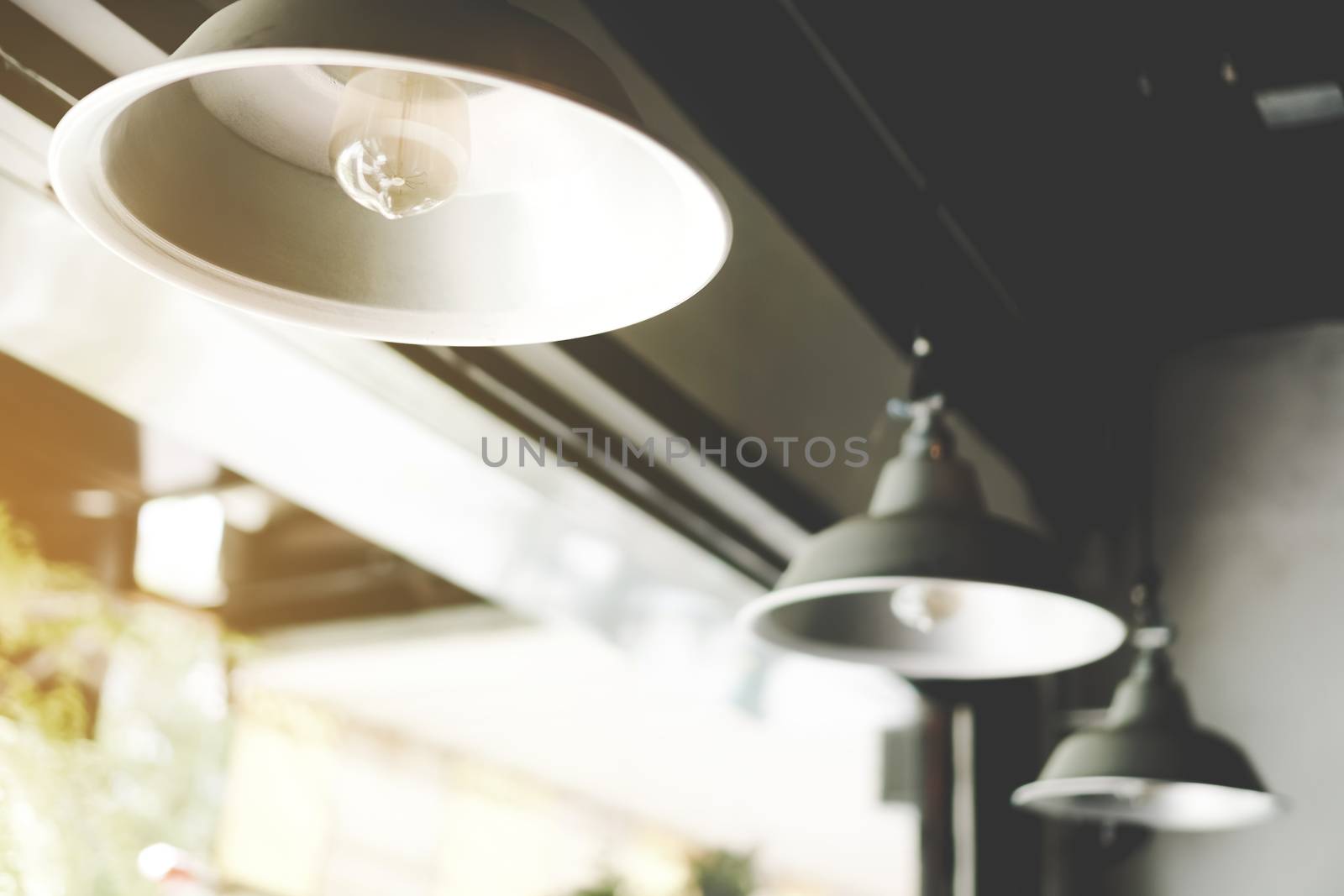 Vintage retro design lamp hang on ceiling minimal concept background.