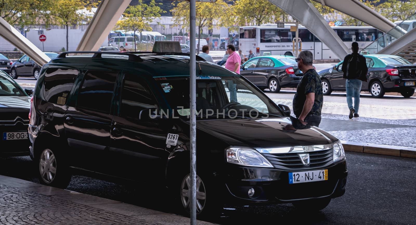 Lisbon, Portugal - May 7, 2018: Taxis cars parked in front of Oriente Intermodal Station Lisbon, a railway and road station completed in 1998 for Expo 98