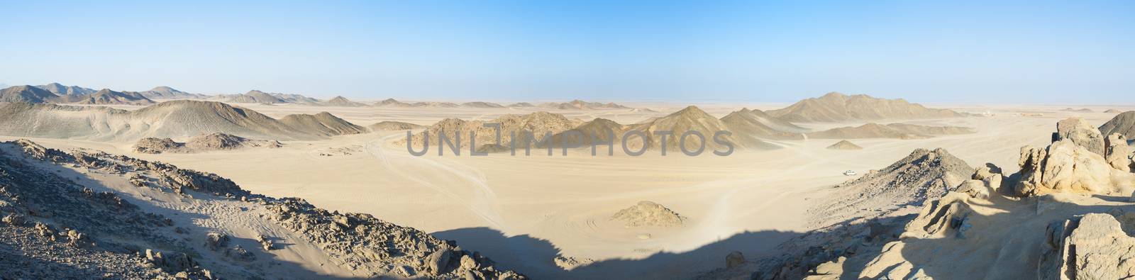 Panoramic view of a rocky desert landscape in africa with mountains