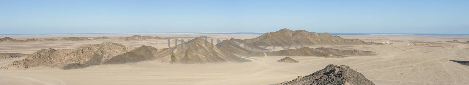 Panoramic view of a rocky desert landscape in africa with mountains