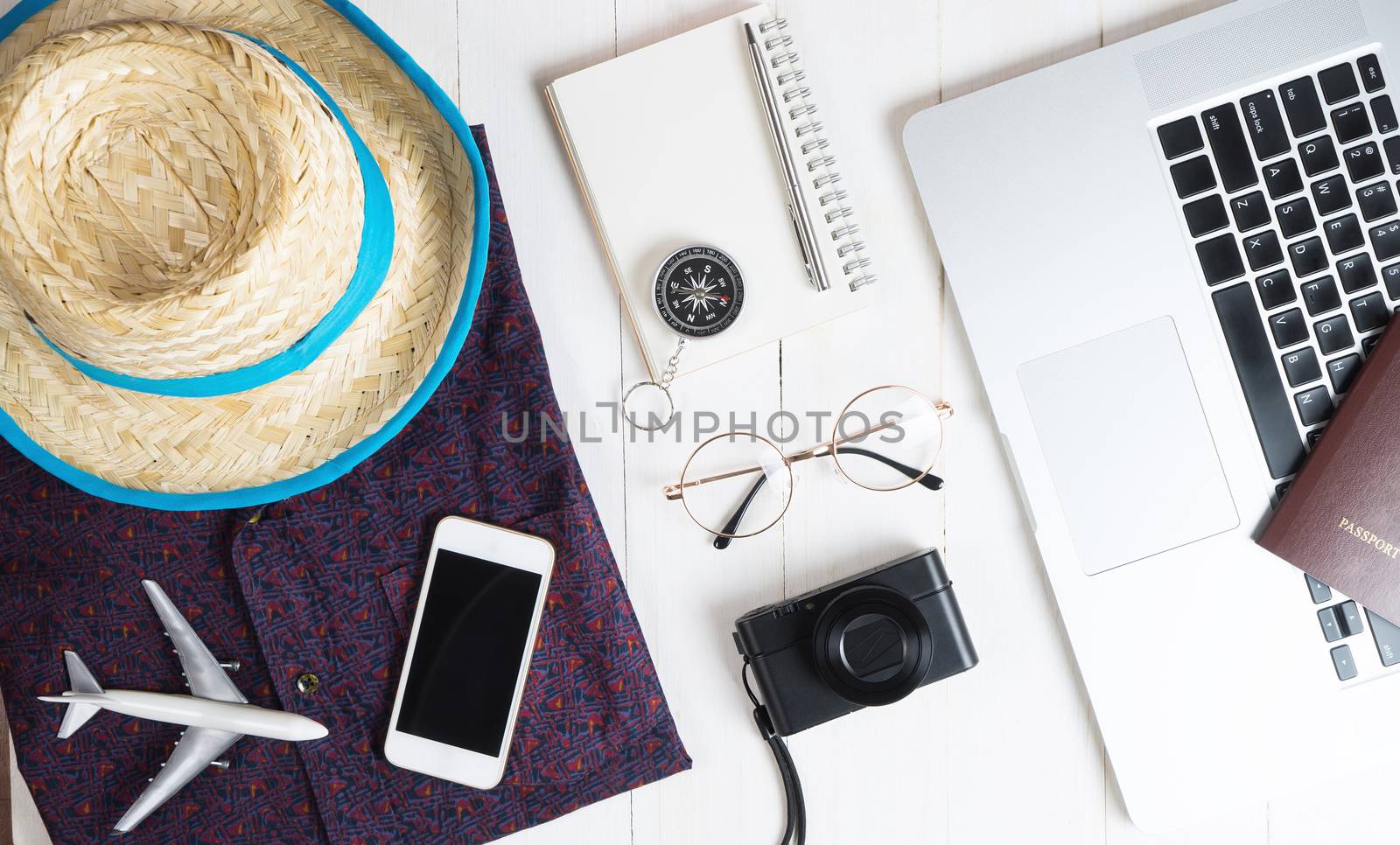Summer business travel accessories on white background