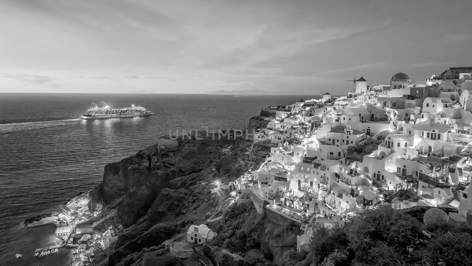 Great twilight view of Santorini island. Sunset on the famous Oia city, Greece, Europe