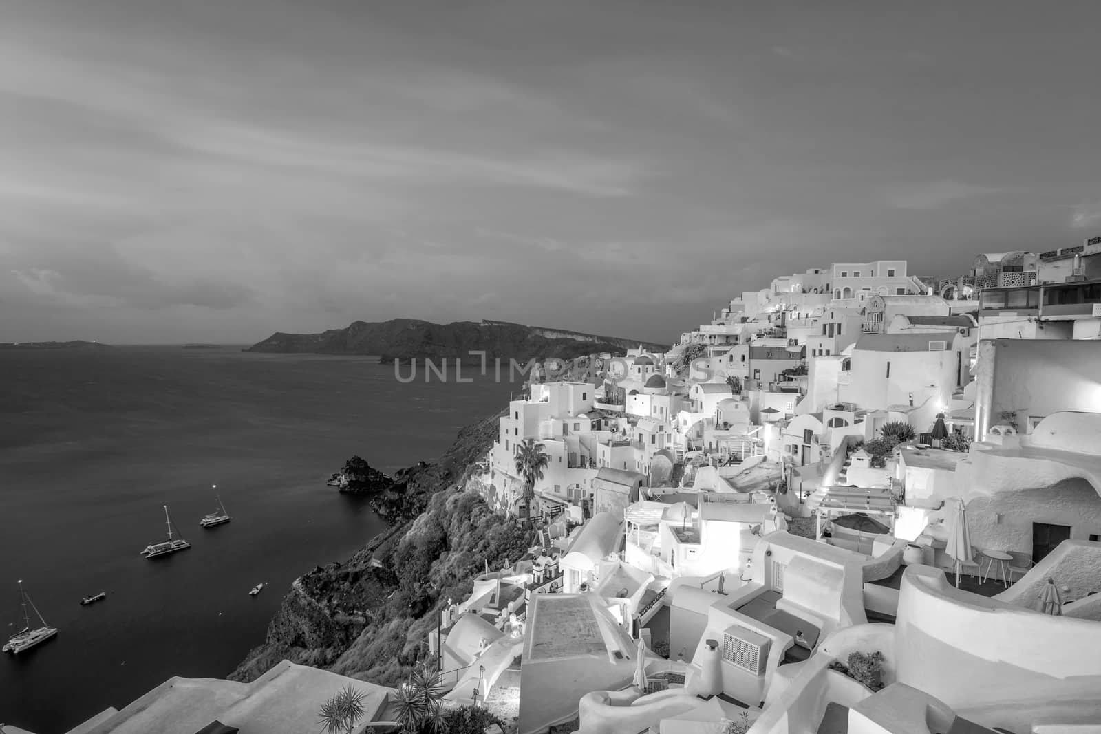 Great twilight view of Santorini island. Sunset on the famous Oia city, Greece, Europe