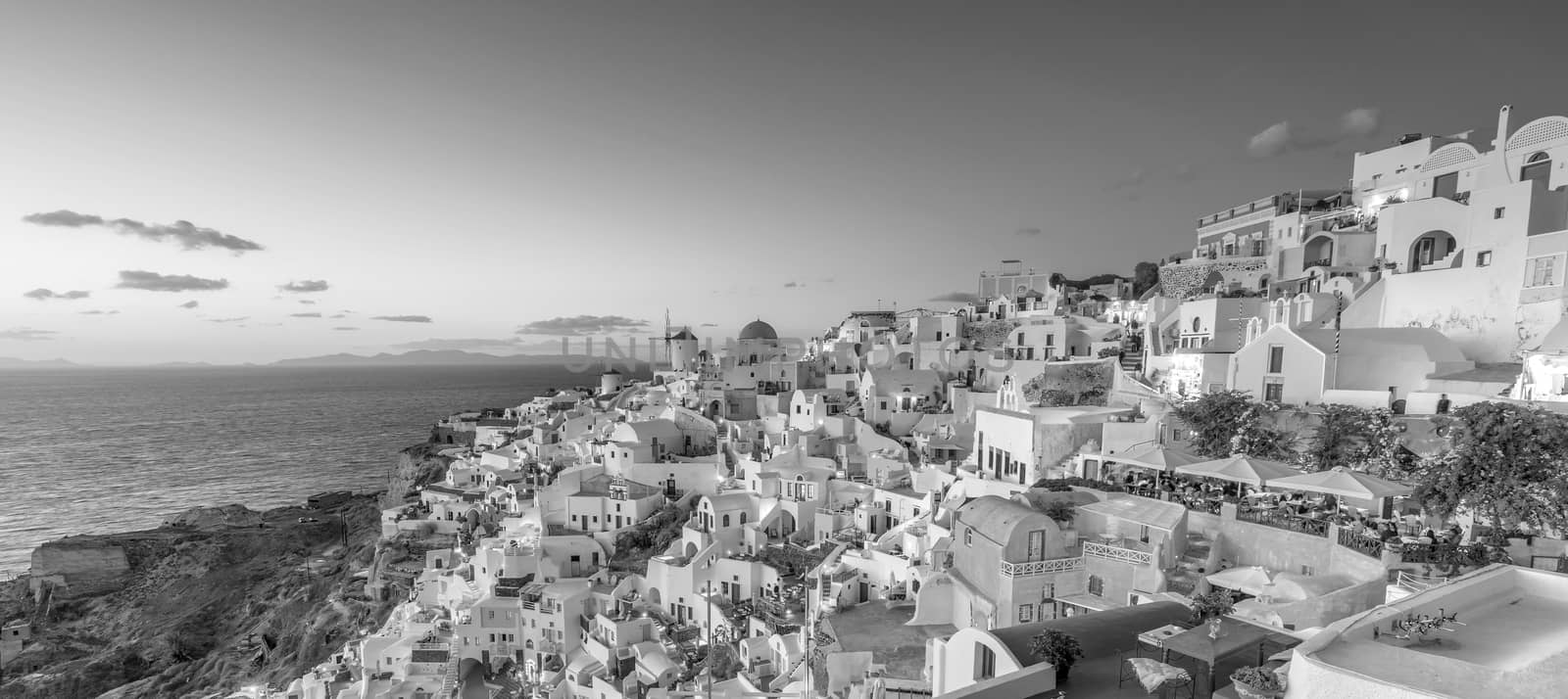 Great twilight view of Santorini island. Sunset on the famous Oia city, Greece, Europe