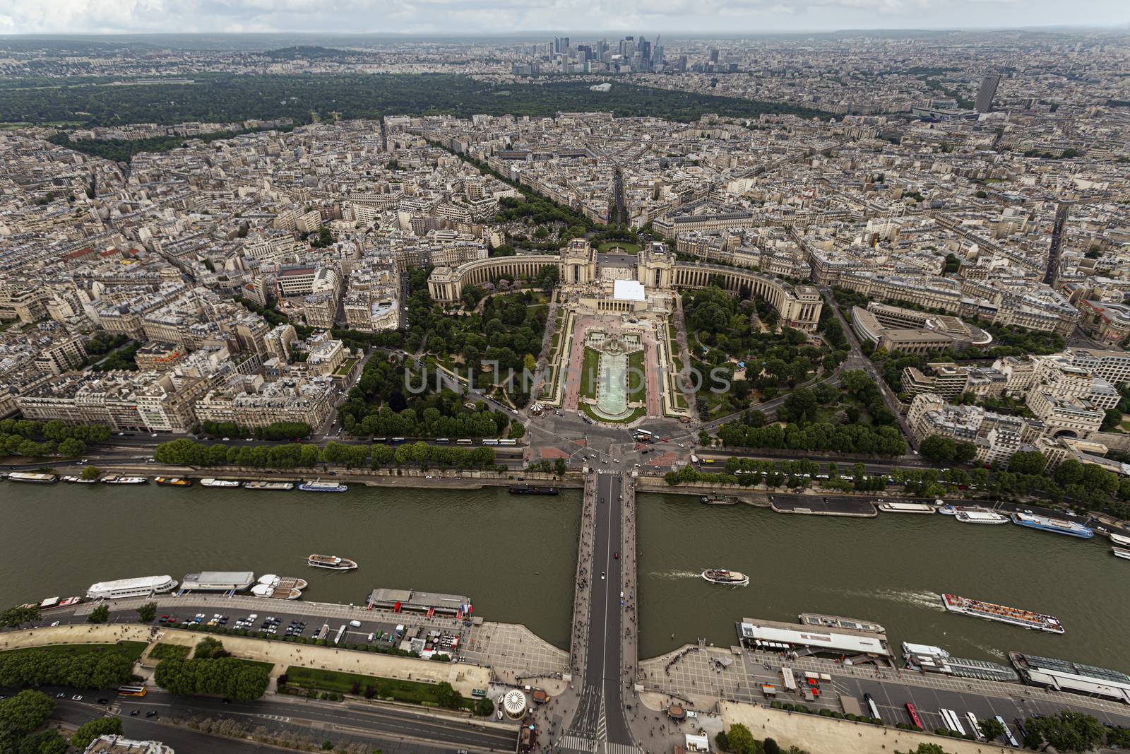 Aerial view from the Eiffel tower on Paris city, Champs de Mars, Trocadéro and skyline toward La Défense business district, France