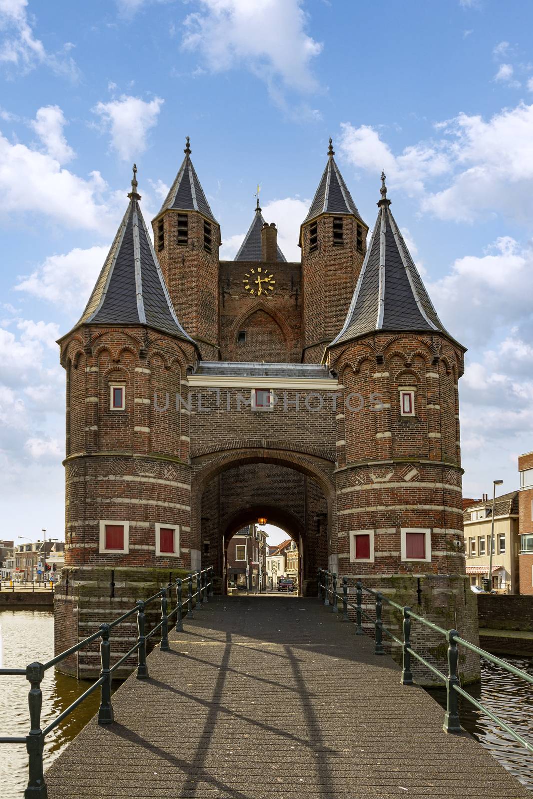 Medieval Haarlem city entry gate above the canal with its bridge and gate keeper towers