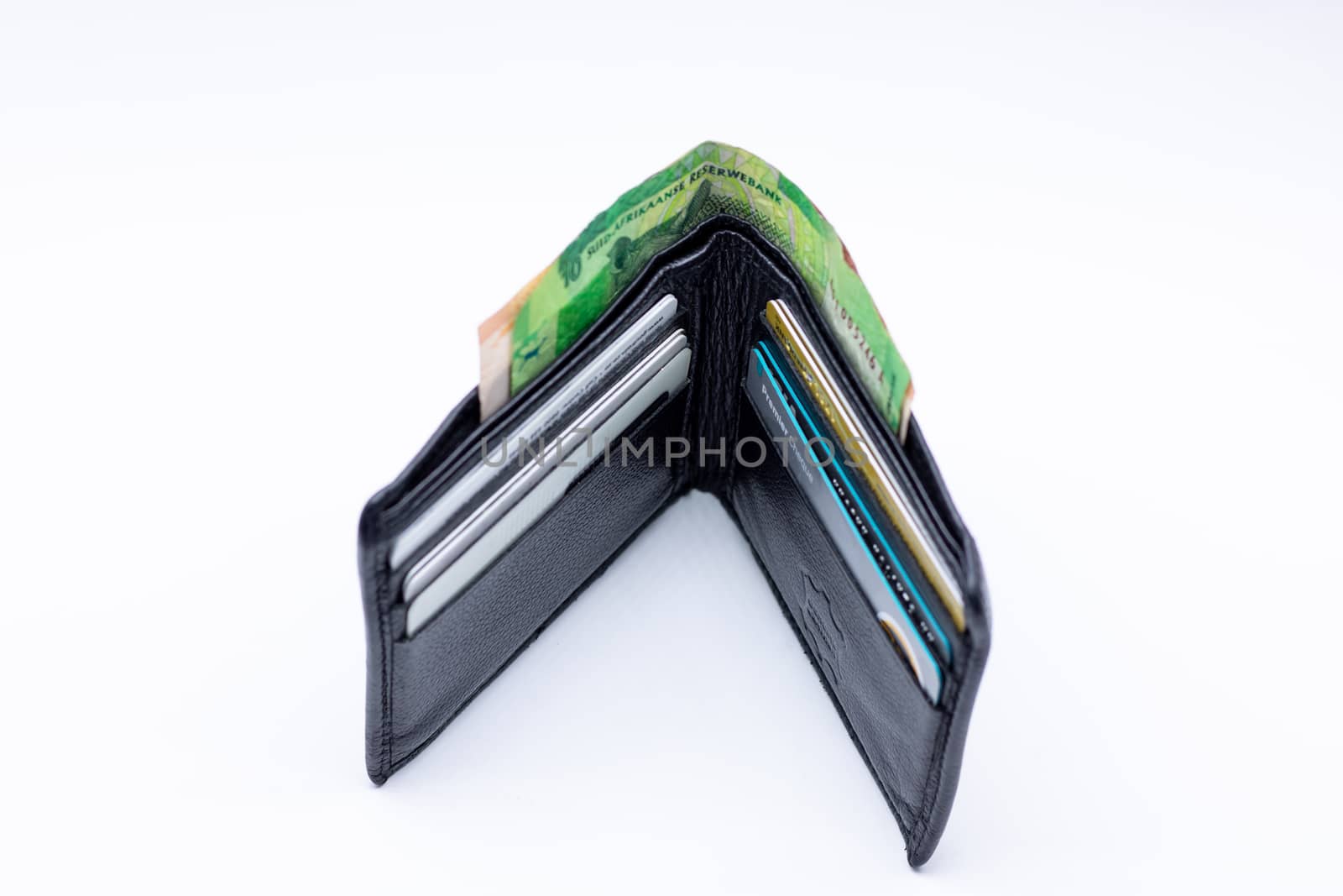 Old black leather wallet by phathisile