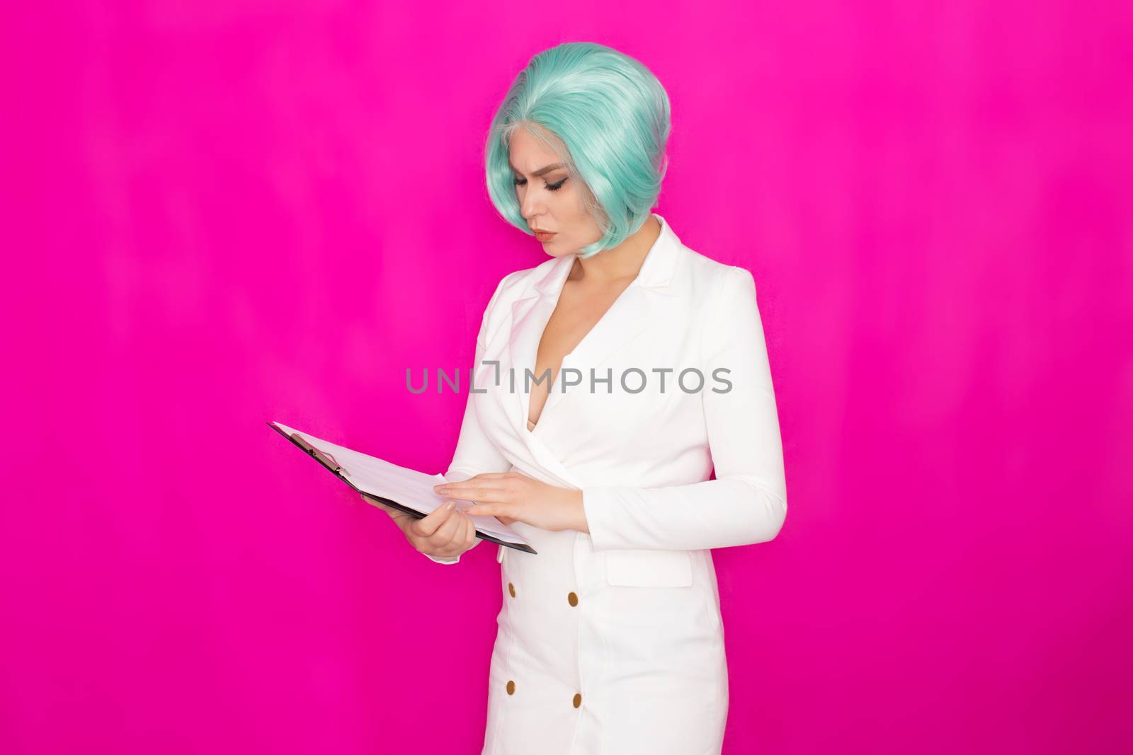 Woman in white jacket dress holding black folder with documents by Bonda