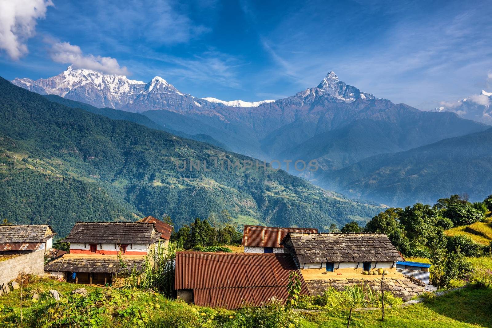 Village in the Himalaya mountains in Nepal by nickfox