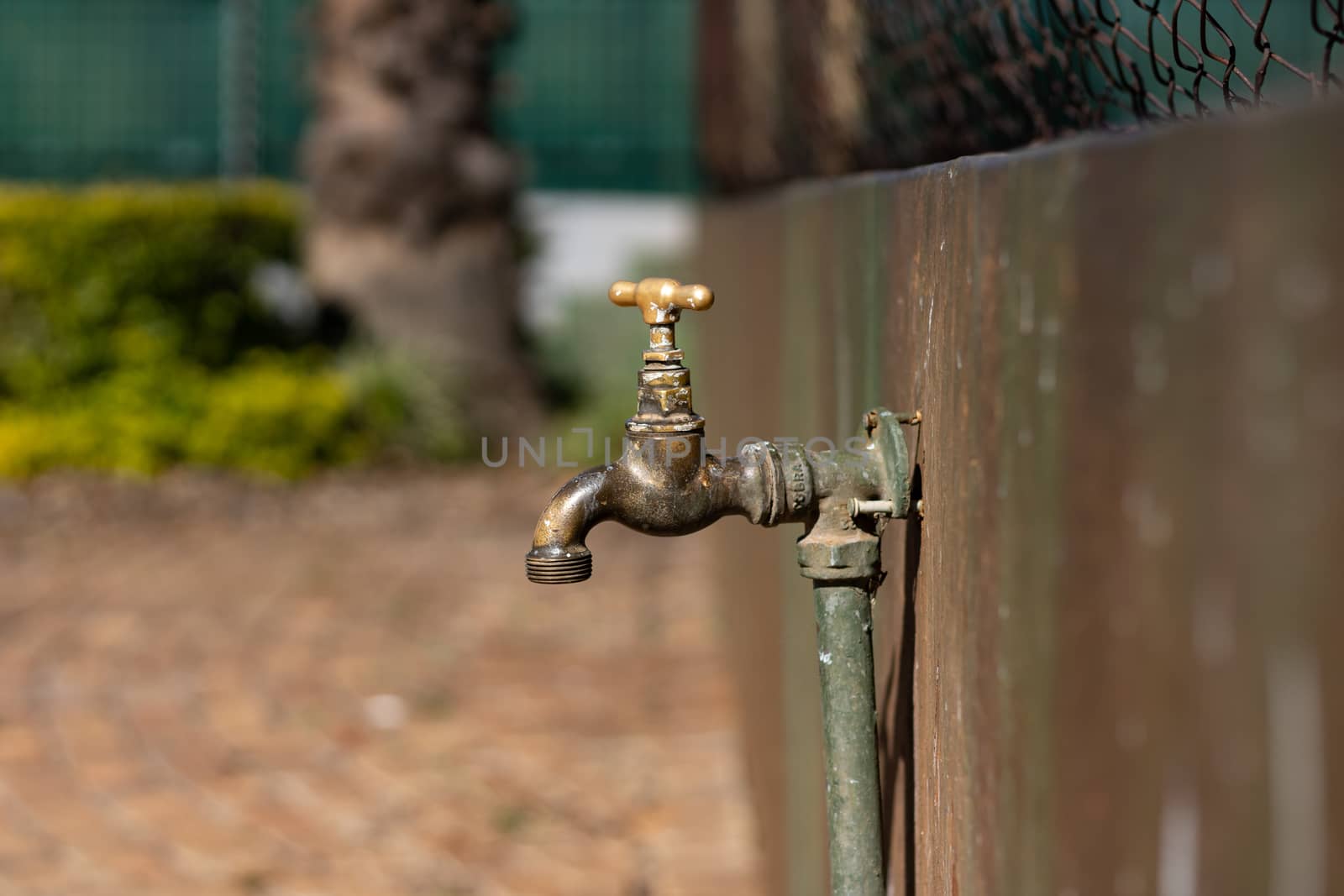 Closed water tap stock photo by phathisile