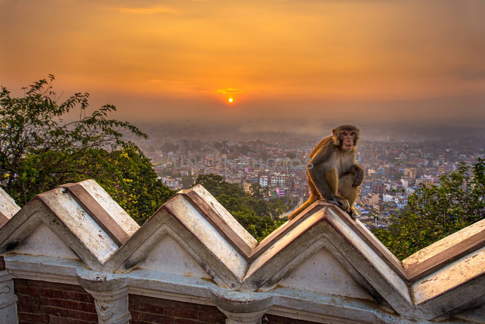 Sunrise above Kathmandu, Nepal, viewed from the Swayambhunath temple. Swayambhunath is also known as the Monkey Temple as there are holy monkeys living in parts of the temple. Hdr processed.