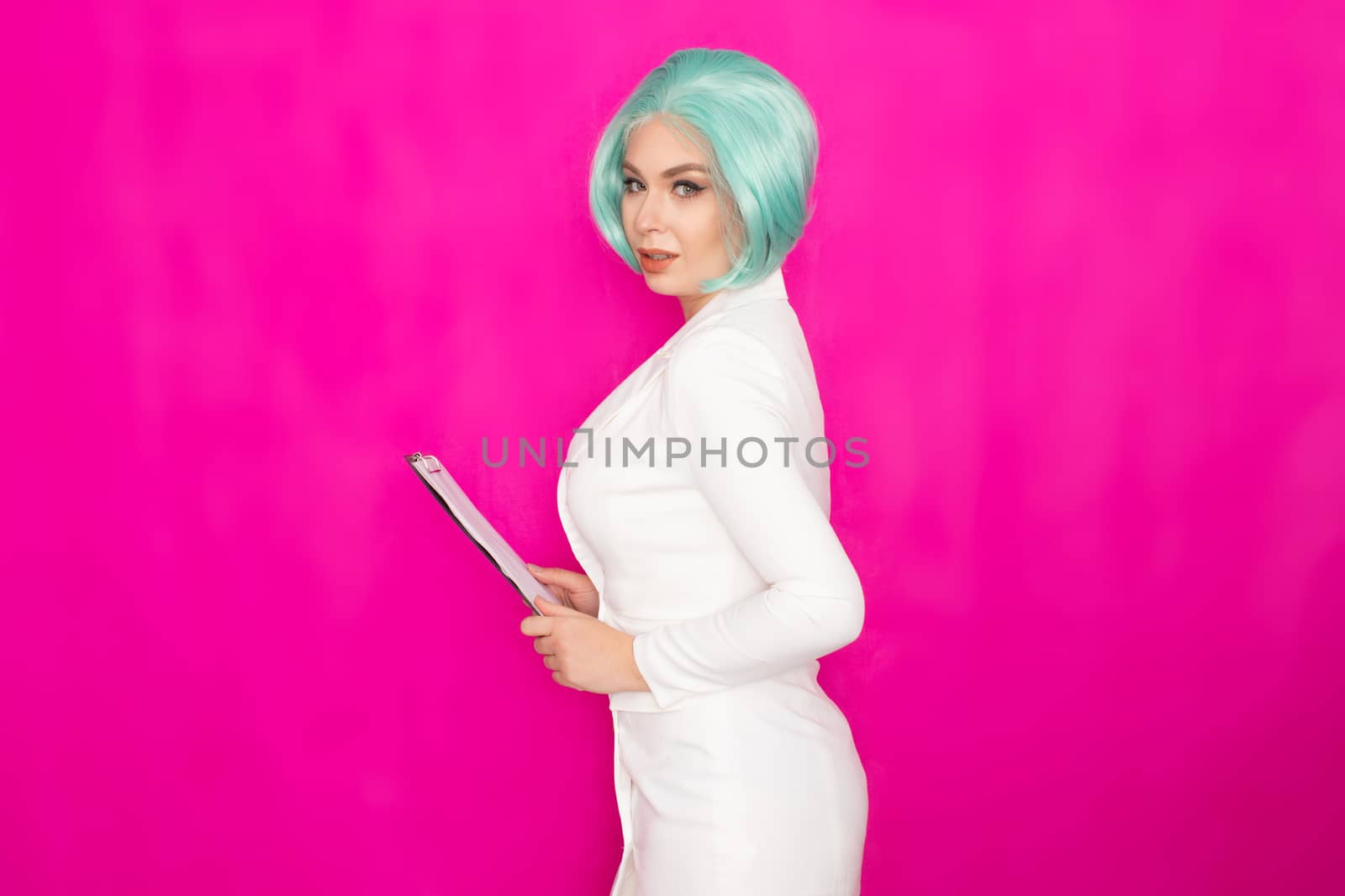 Woman in white jacket dress holding black folder with documents by Bonda